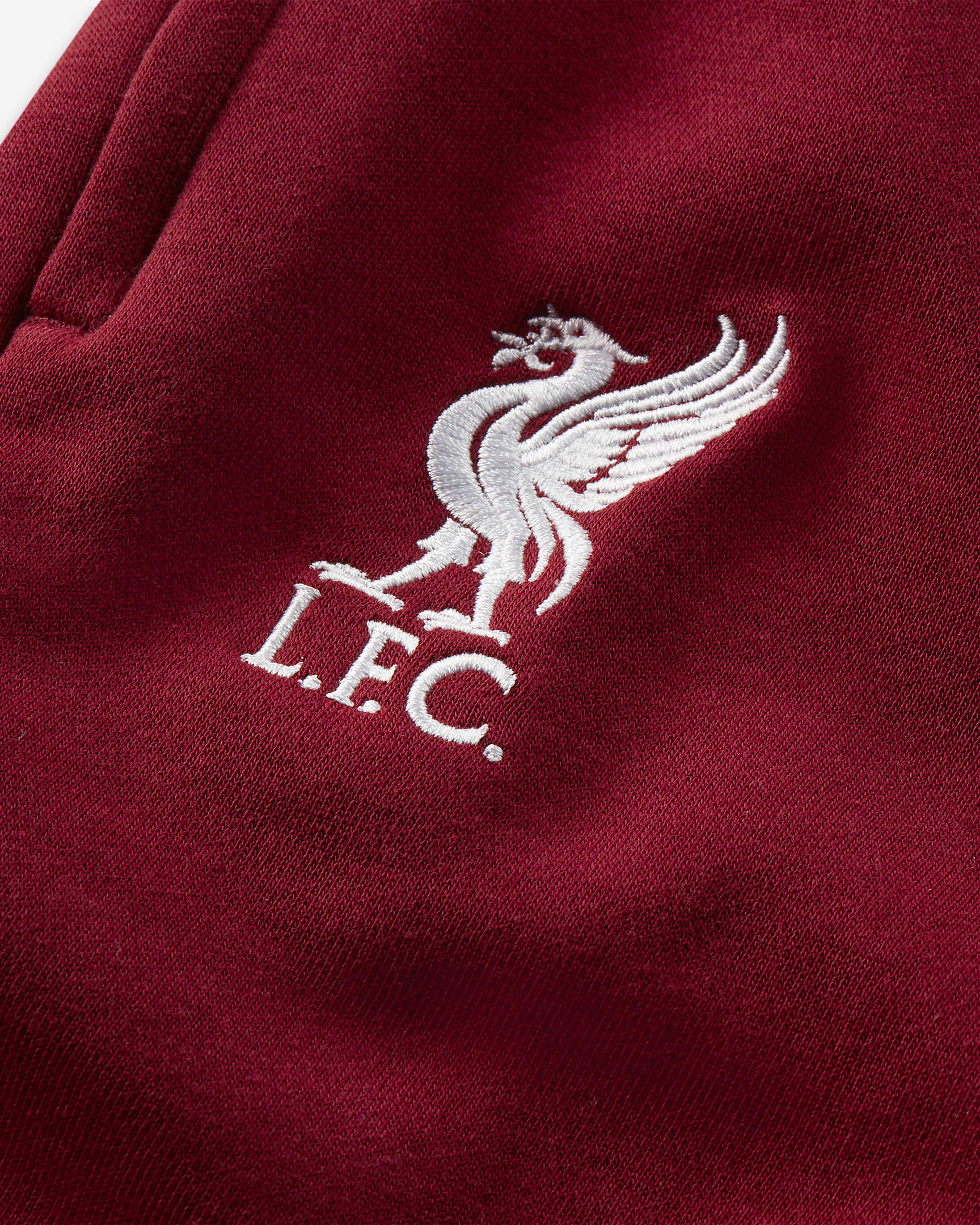 Liverpool F.C. Older Kids' Nike Fleece Pants. Nike UK