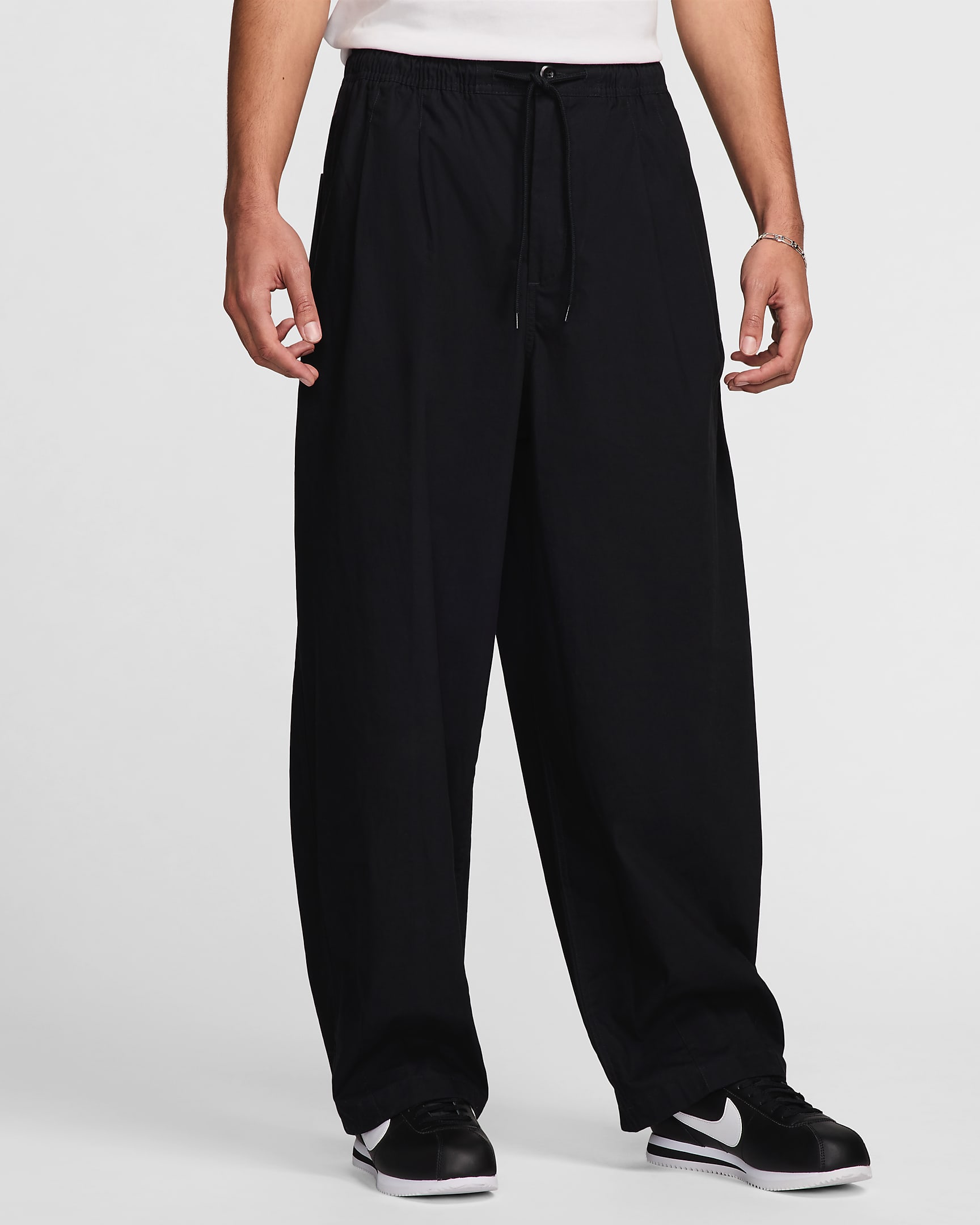 Pants globo para hombre Nike Club - Negro/Negro