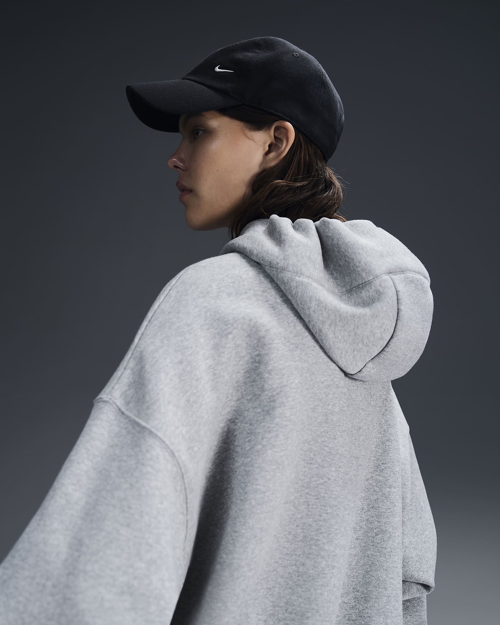 Huvtröja i extra oversize-modell Nike Sportswear Phoenix Fleece för kvinnor - Dark Grey Heather/Sail