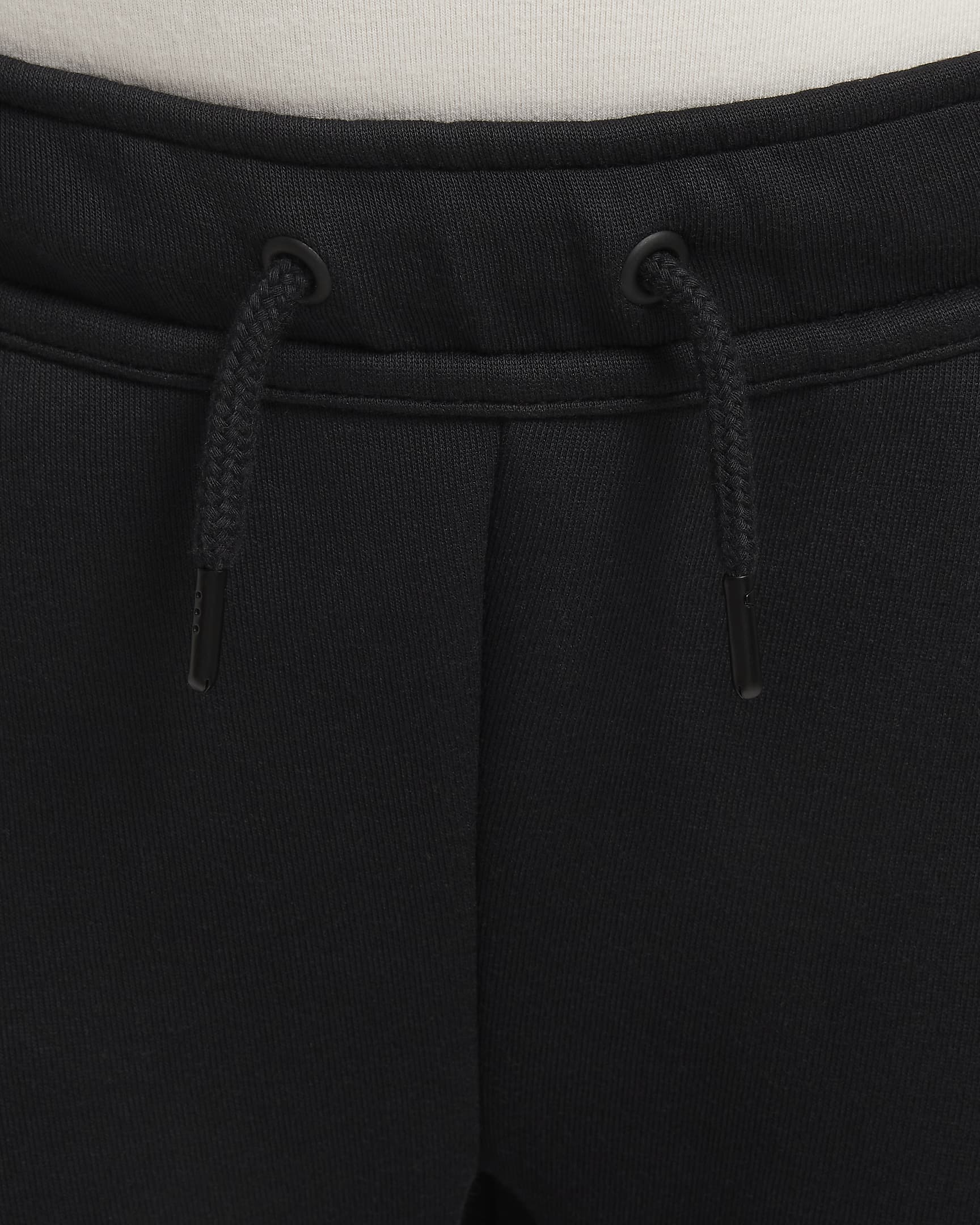 Nike Sportswear Tech Fleece fényvisszaverő szabadidőnadrág nagyobb gyerekeknek - Fekete