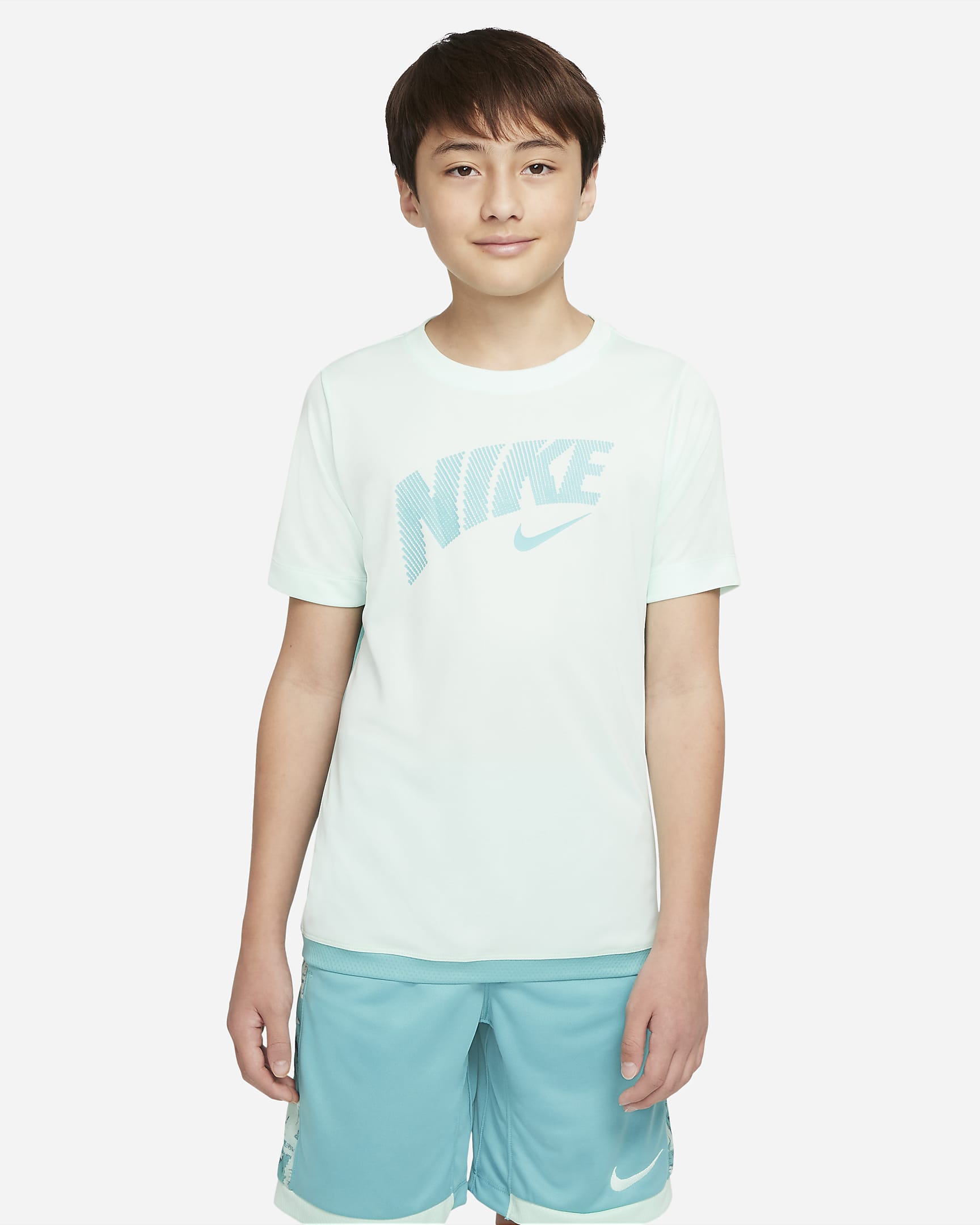เสื้อเทรนนิ่งเด็กโตมีกราฟิก Nike Dri-FIT Trophy (ชาย) - Mint Foam/Washed Teal/Washed Teal