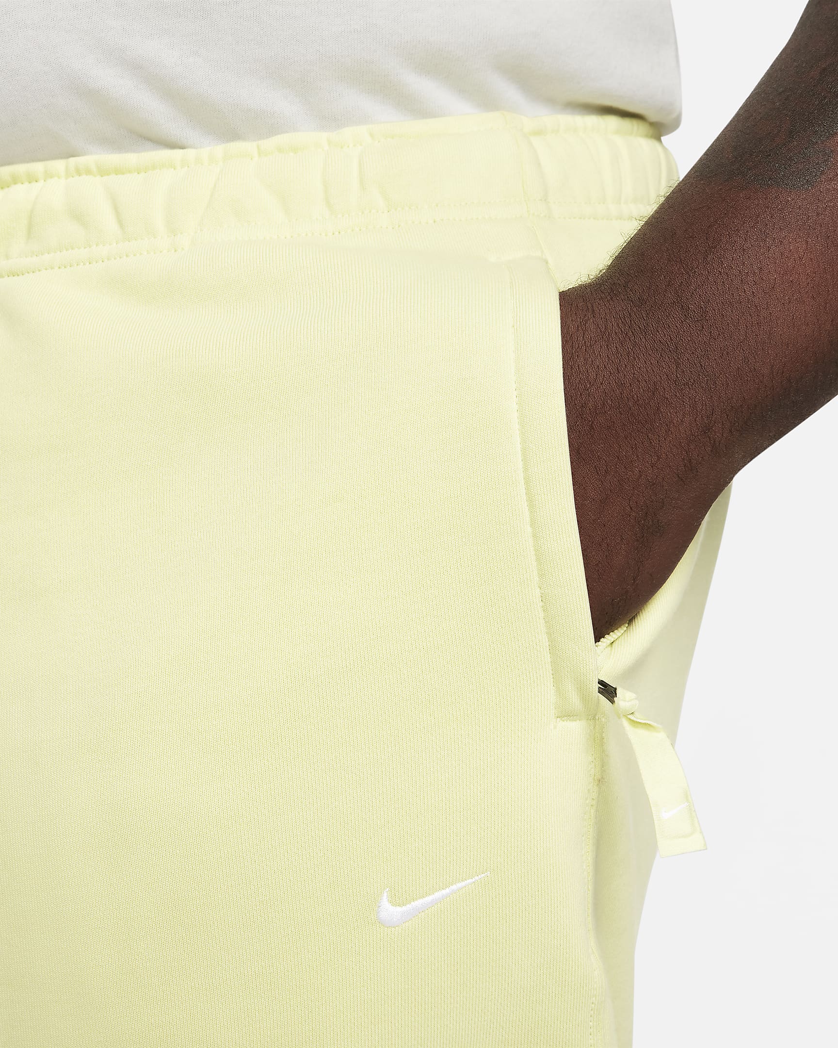 Pants de tejido Fleece para hombre Nike Solo Swoosh - Verde luminoso/Blanco