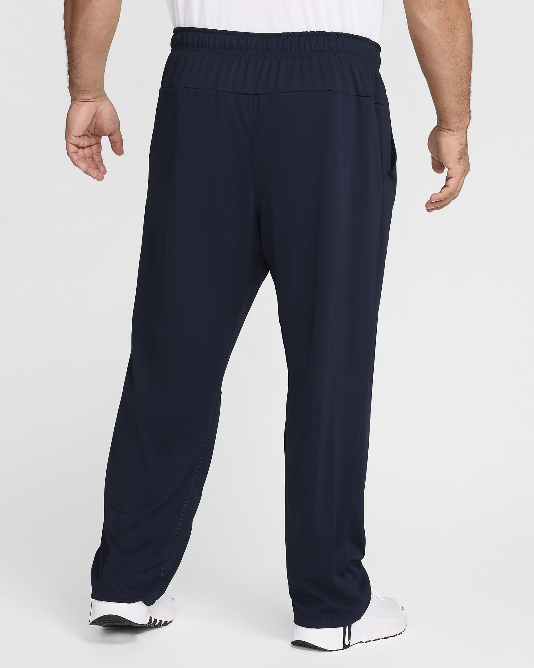 Pants Dri-FIT versátiles con dobladillo abierto para hombre Nike Totality - Obsidiana/Negro