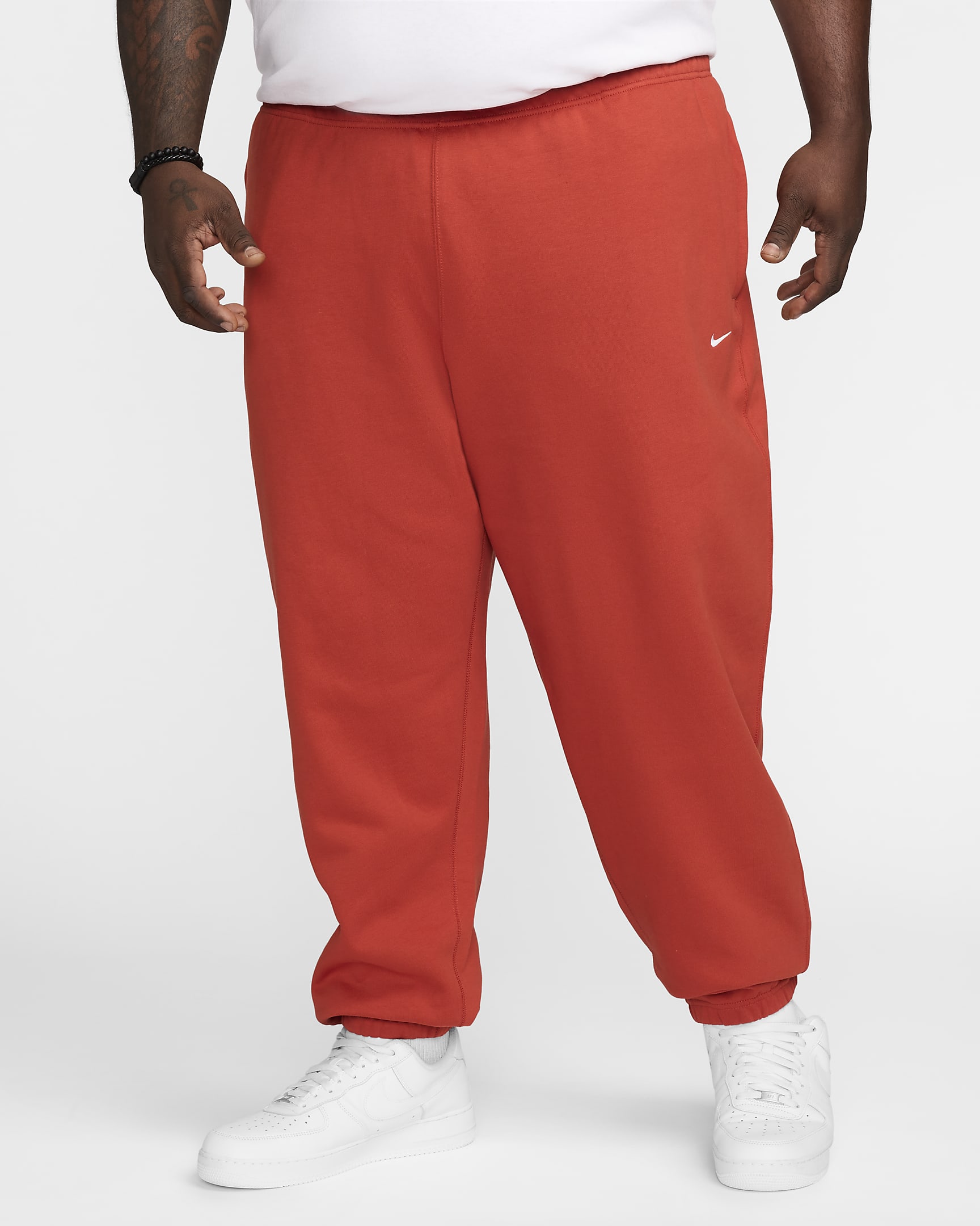 Pantalon en tissu Fleece Nike Solo Swoosh pour Homme - Dragon Red/Blanc