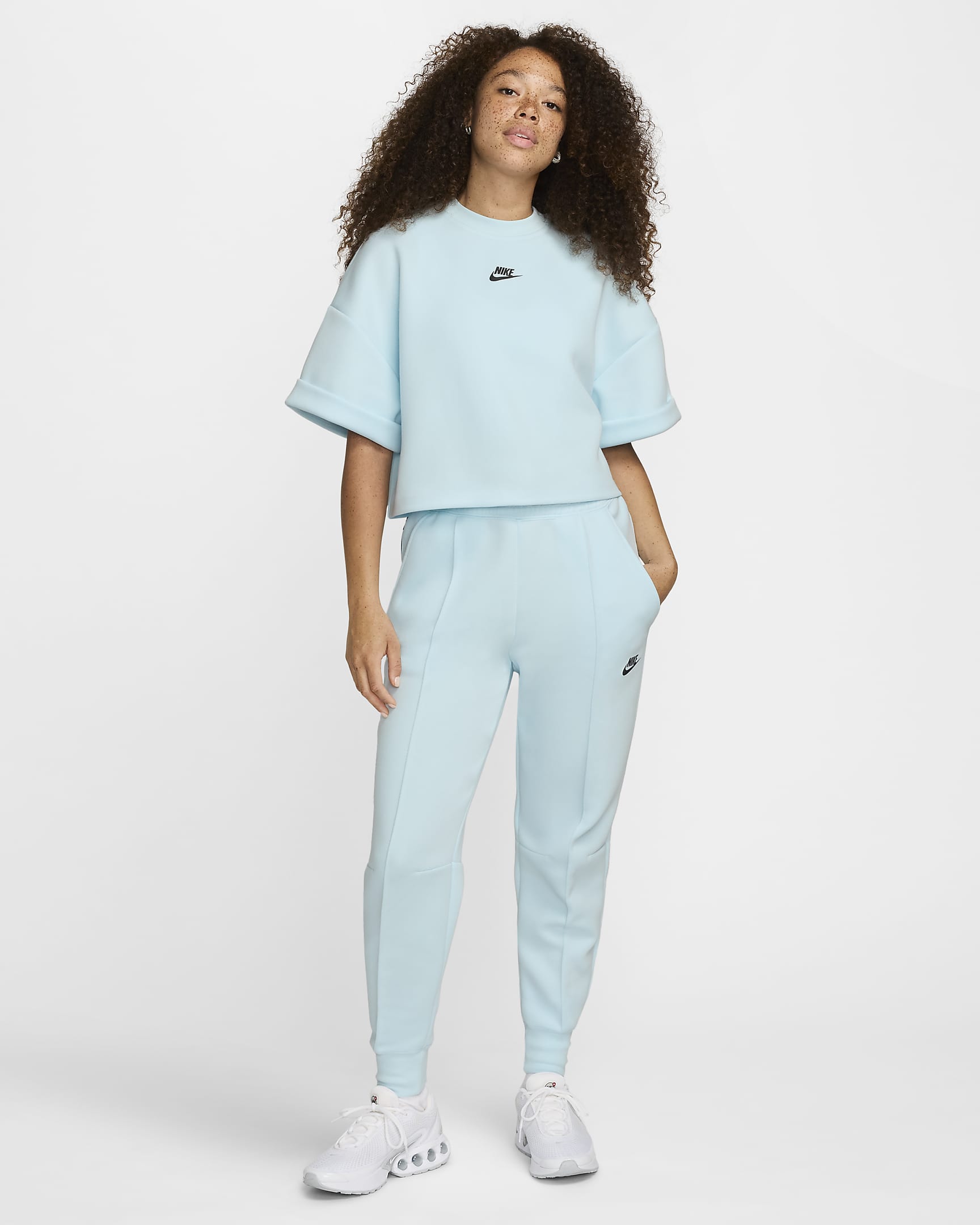 Playera cropped de manga corta oversized para mujer Nike Sportswear Tech Fleece - Azul glacial/Negro