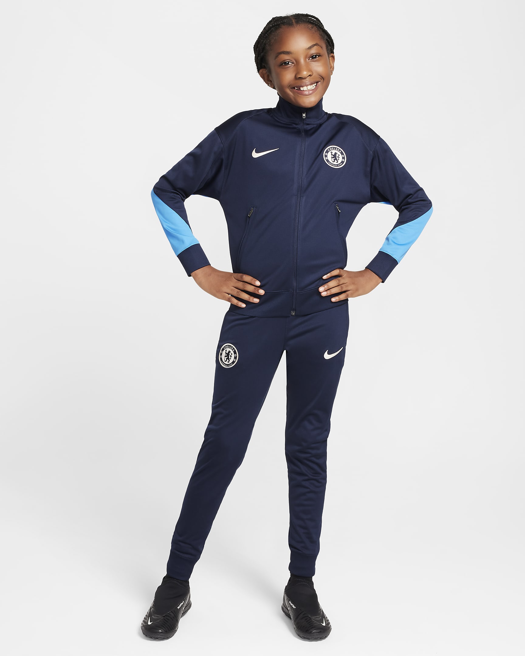 Chelsea F.C. Strike Older Kids' Nike Dri-FIT Football Knit Tracksuit - Obsidian/Light Photo Blue/Guava Ice