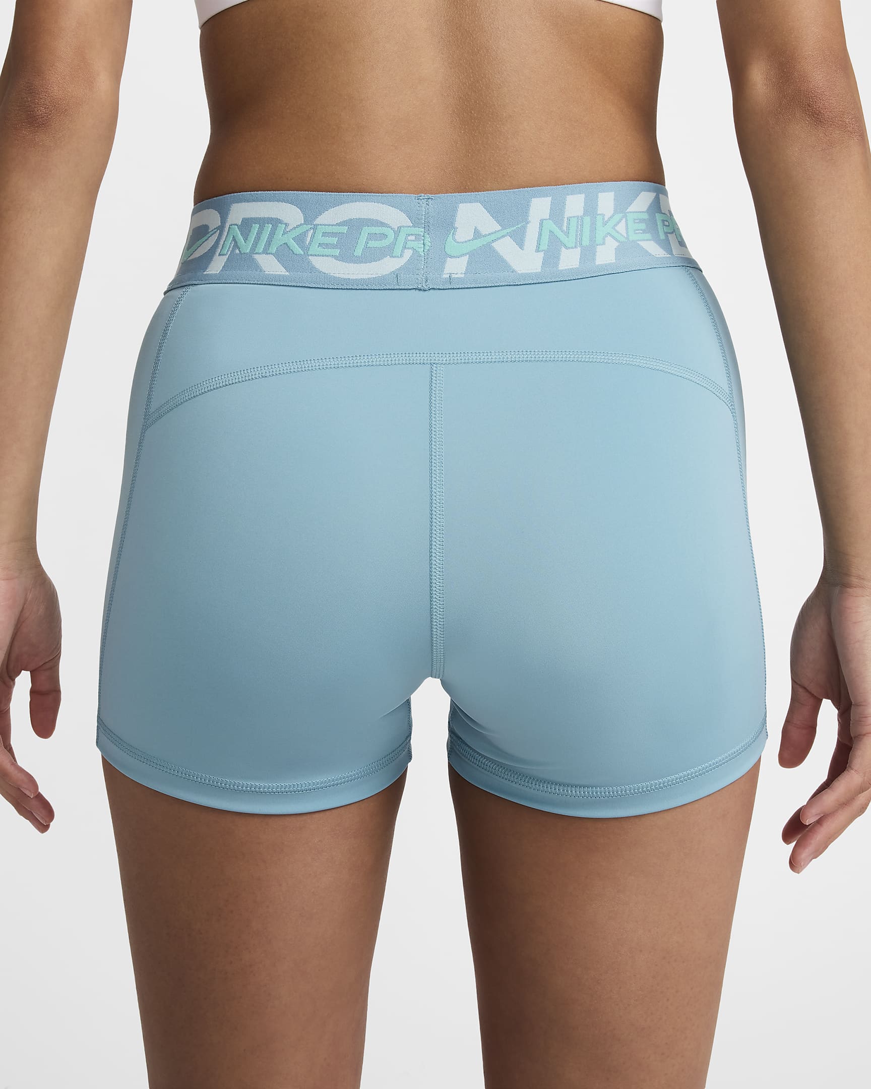 Shorts de ciclismo con gráfico de tiro medio de 8 cm para mujer Nike Pro - Denim turquesa/Azul glacial/Escarcha verde/Blanco