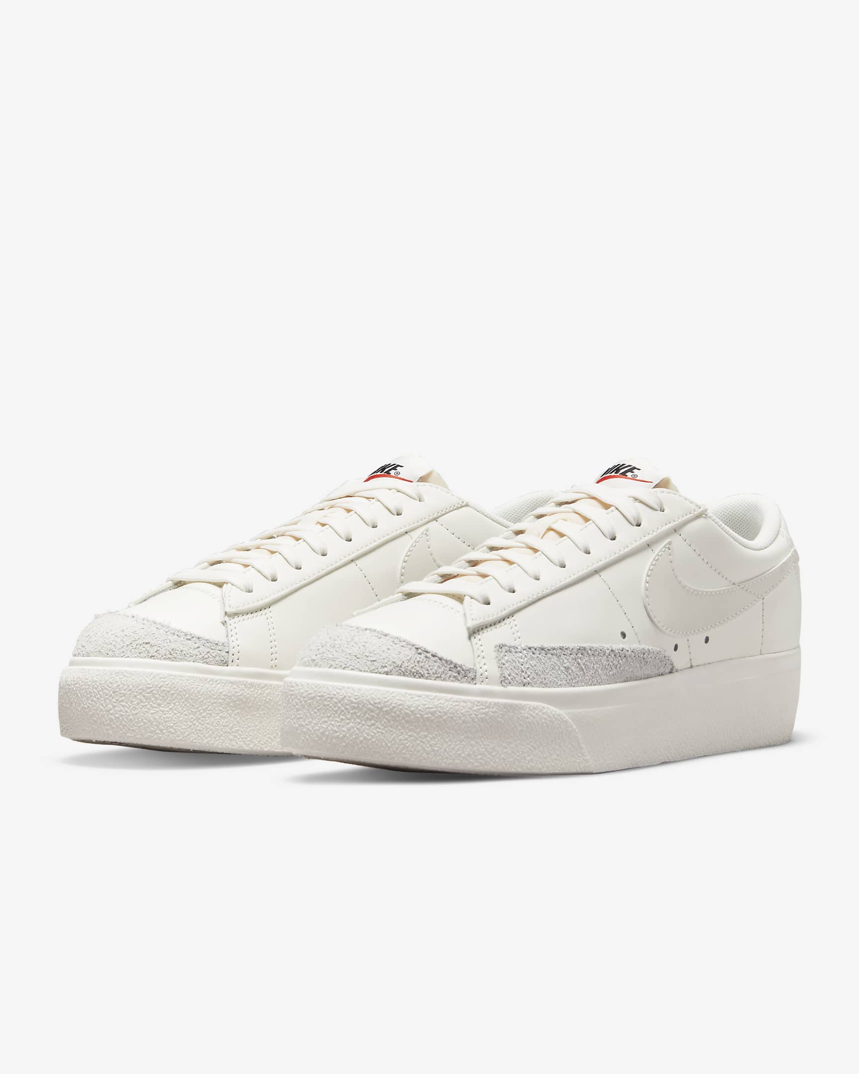 white and purple jordans 1