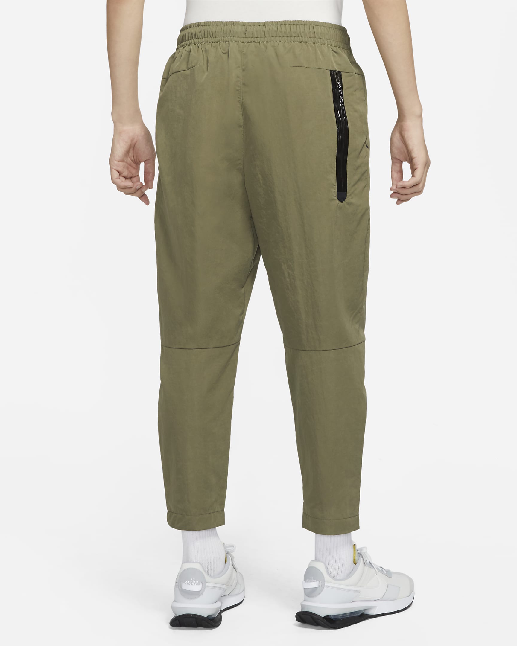 Nike Sportswear Tech Essentials Men's lined Commuter Pants. Nike.com