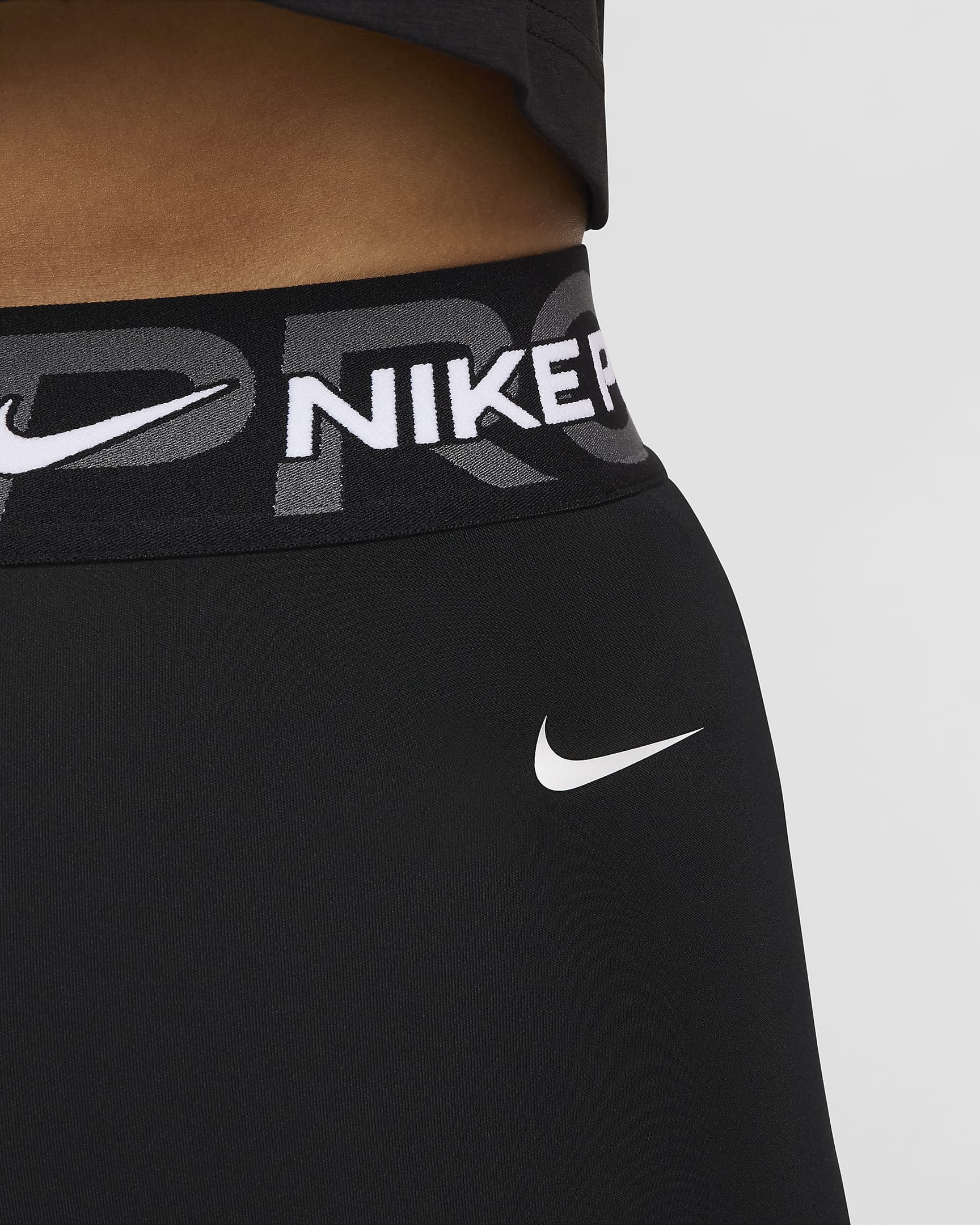 เลกกิ้งเอวปานกลาง 7/8 ส่วนผู้หญิงมีกราฟิก Nike Pro - ดำ/Iron Grey/ขาว/ขาว