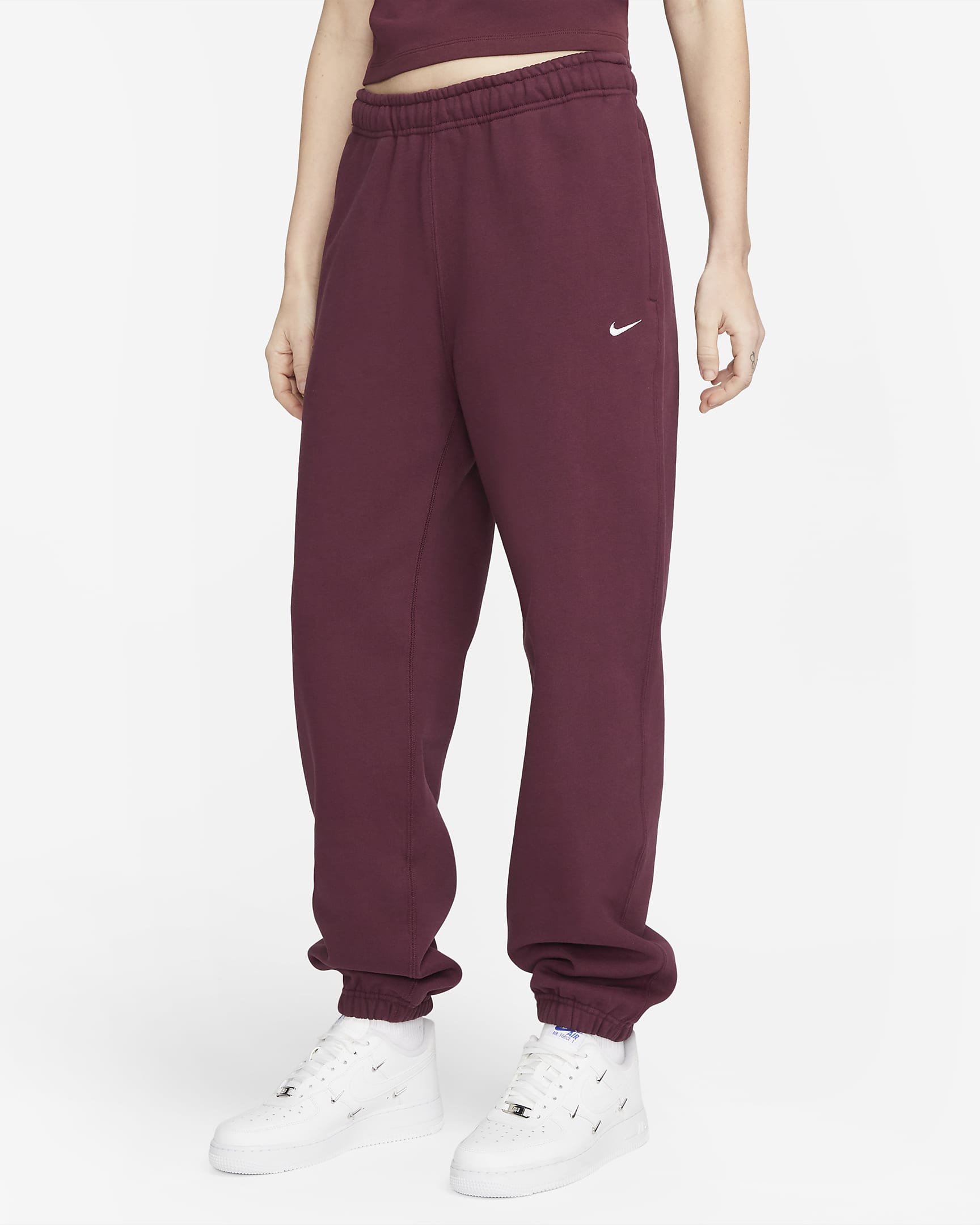 Pantaloni in fleece Nike Solo Swoosh - Donna - Night Maroon