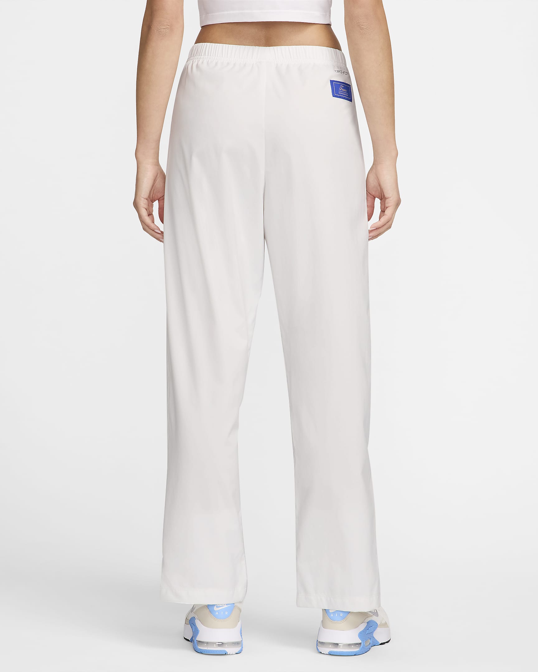 Pantaloni da calcio in tessuto a vita alta Nike Dri-FIT FFF Tech Pack – Donna - Summit White/Club Gold