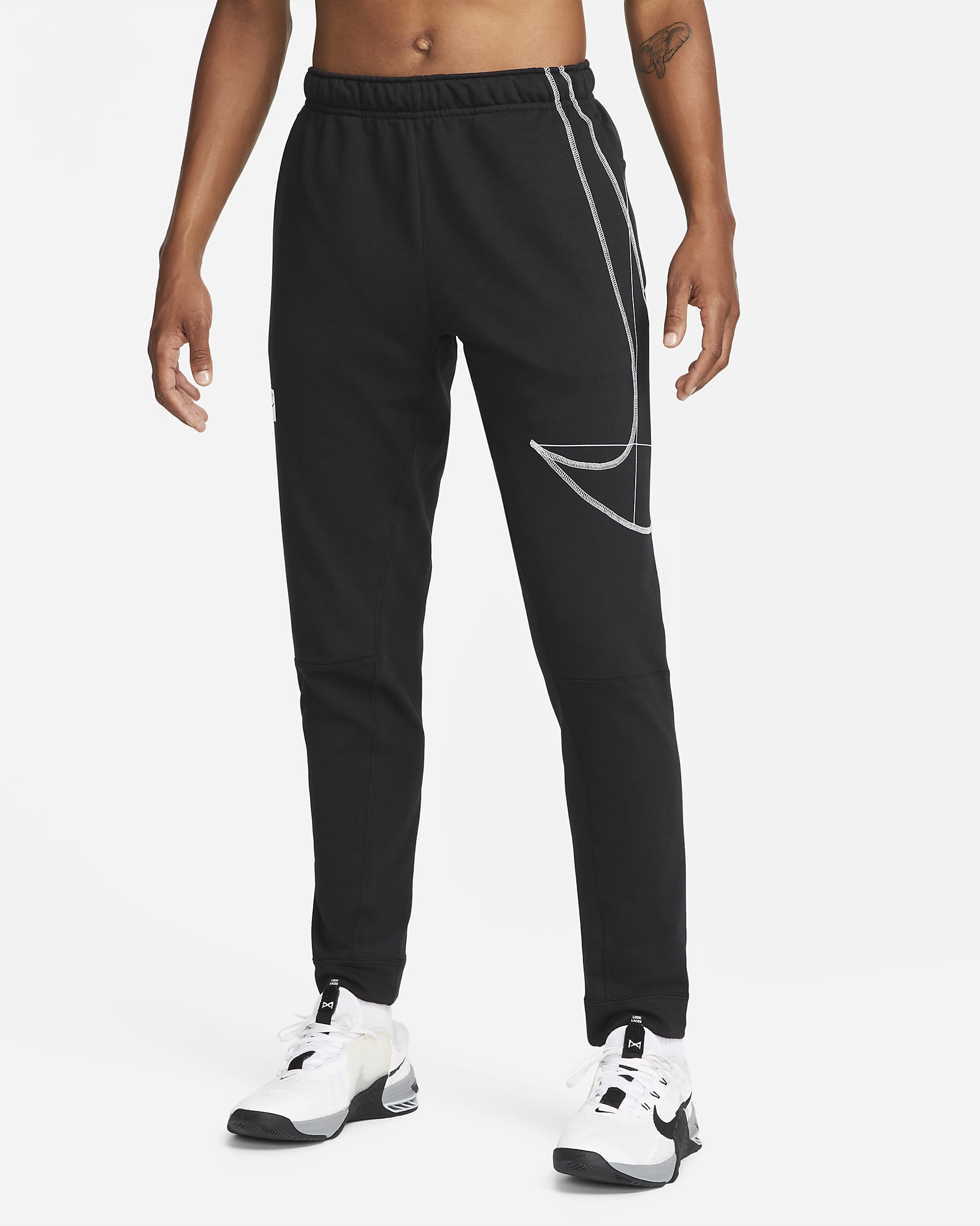 Nike DriFIT Men's Fleece Tapered Running Pants.