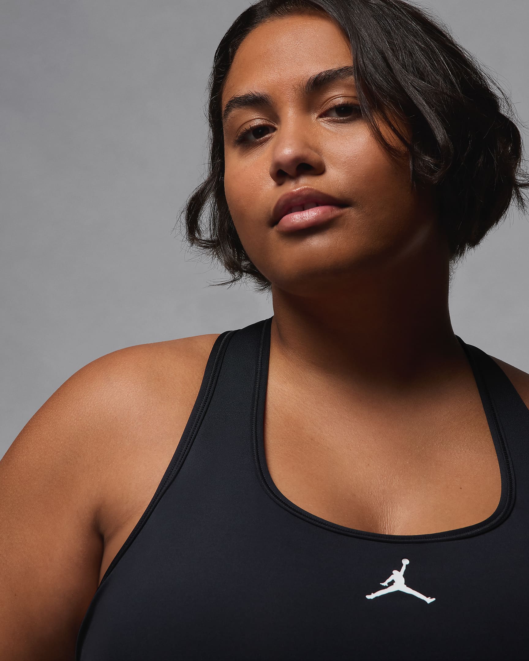 Bra Jumpman de media sujeción con almohadillas para mujer (talla grande) Jordan Sport - Negro/Blanco