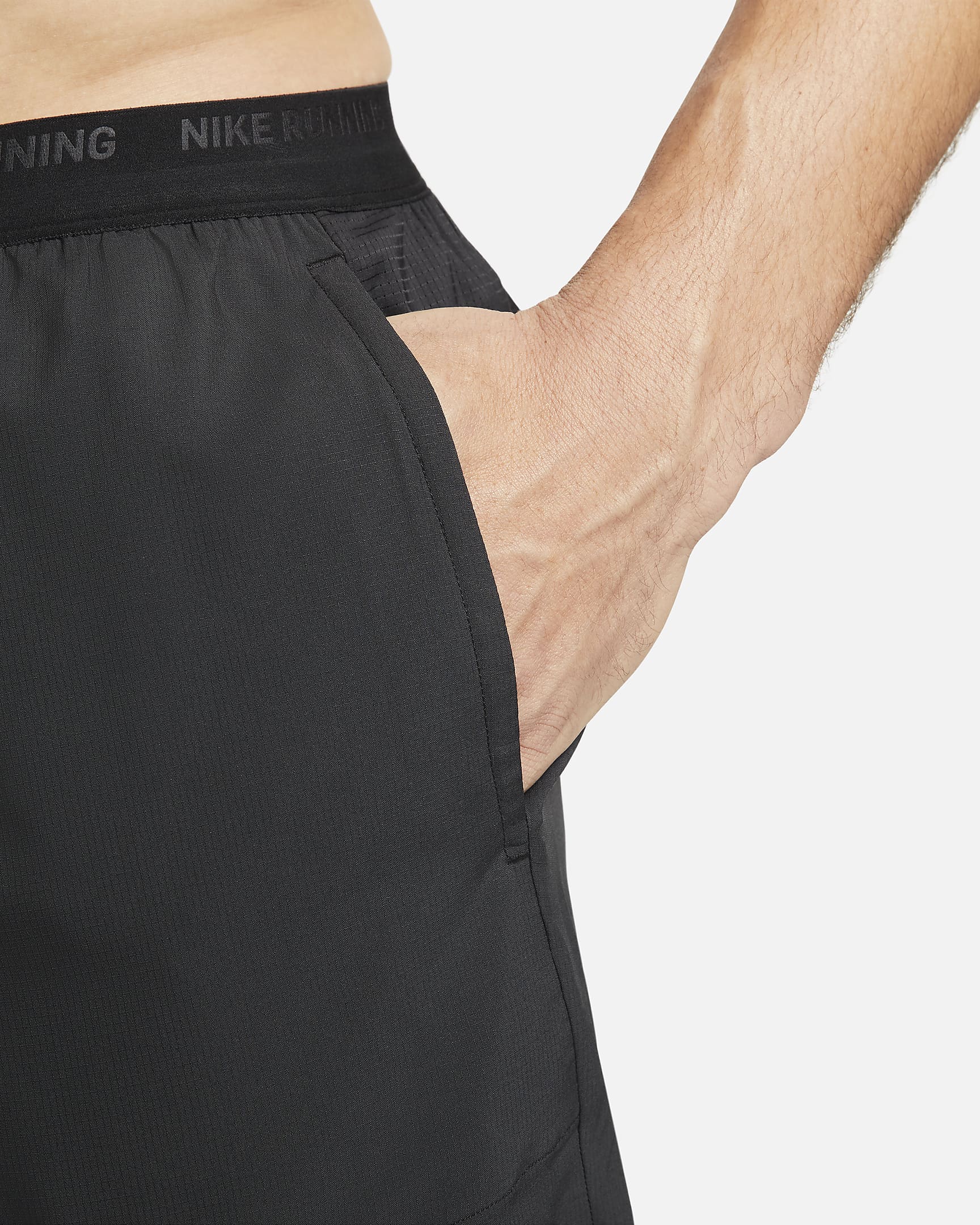 Shorts de correr Dri-FIT de 18 cm con forro de ropa interior para hombre Nike Stride - Negro/Negro