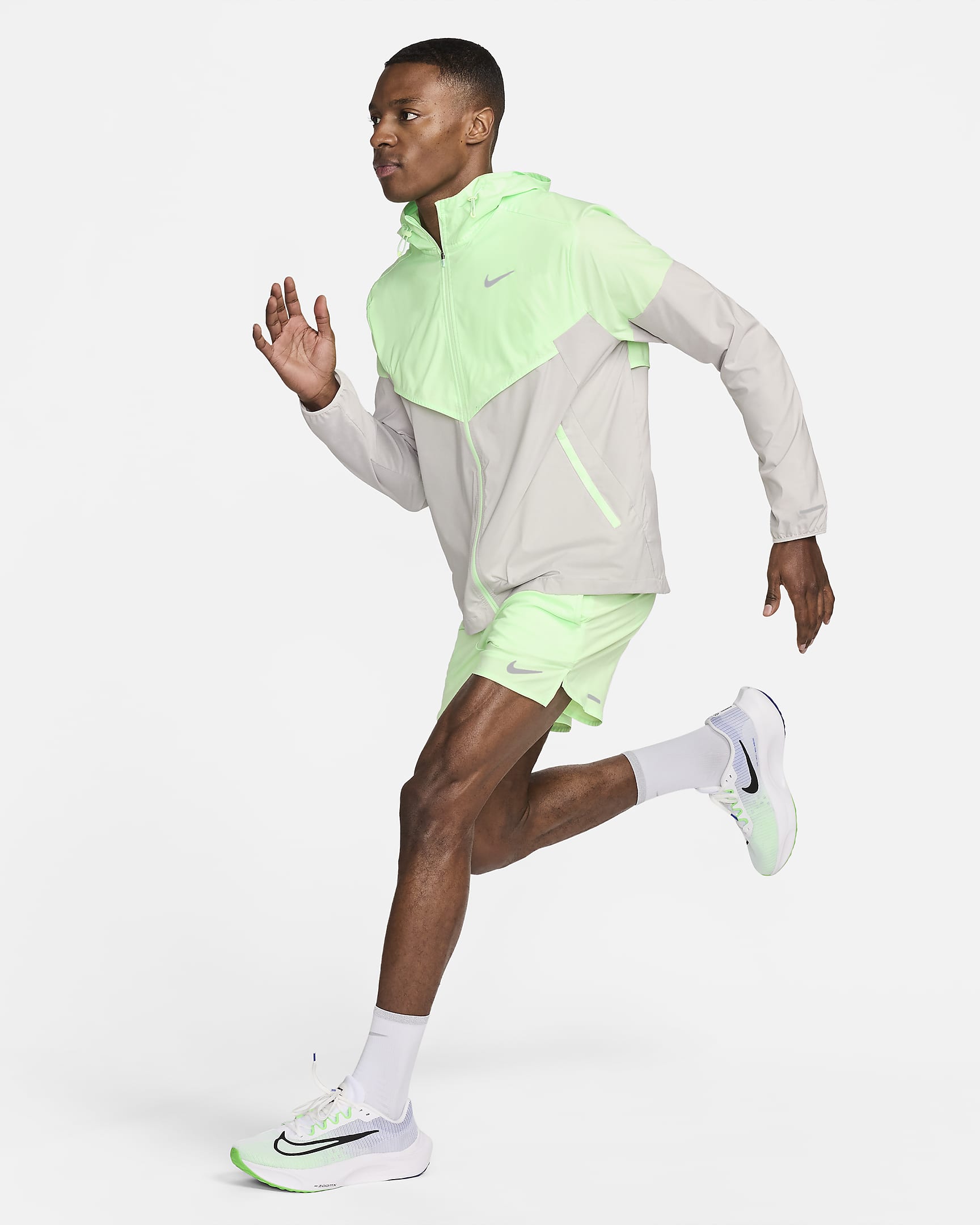 Chamarra de correr Repel para hombre Nike Windrunner - Verde vapor/Mena de hierro claro