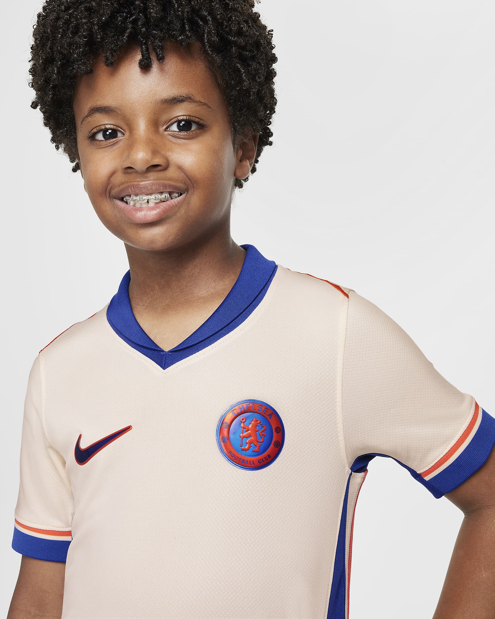 Chelsea F.C. 2024/25 Stadium Away Older Kids' Nike Dri-FIT Football Replica Shirt - Guava Ice/Team Orange/Rush Blue