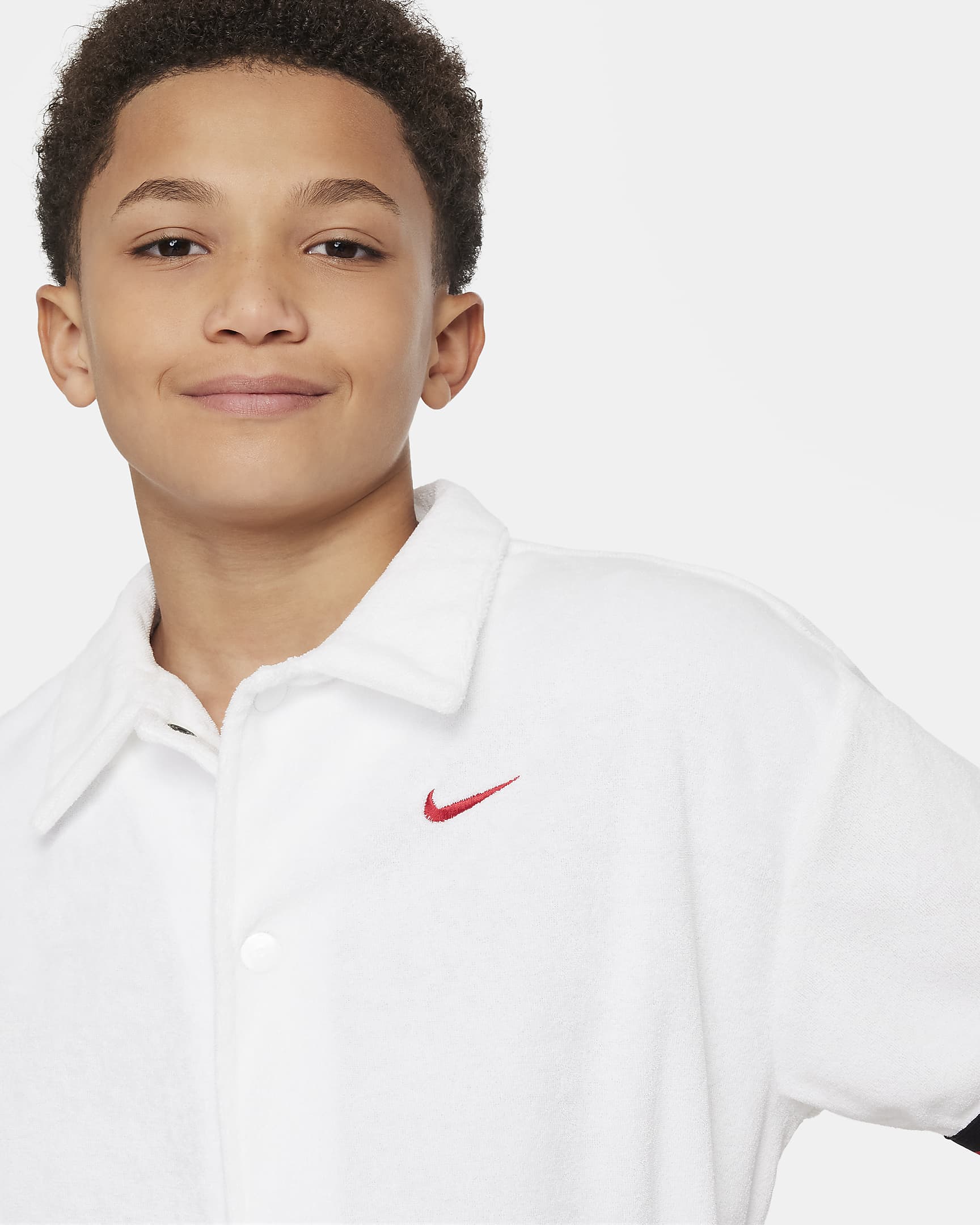 Nike Culture of Basketball Big Kids' ShortSleeve Top.