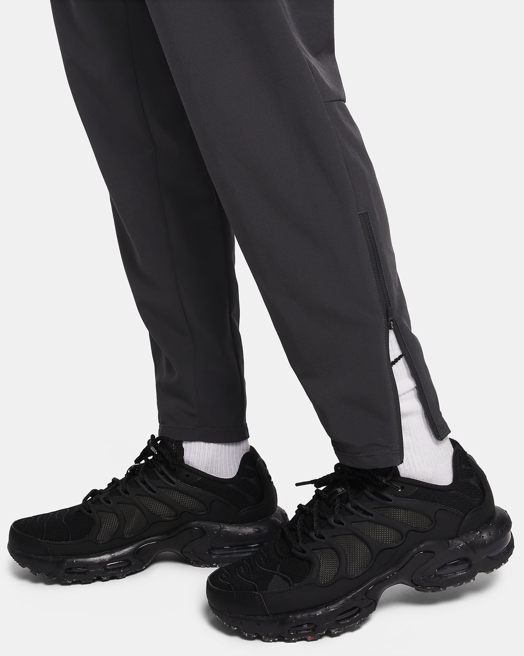 Nike Air Max Men's Dri-FIT Woven Trousers. Nike NL