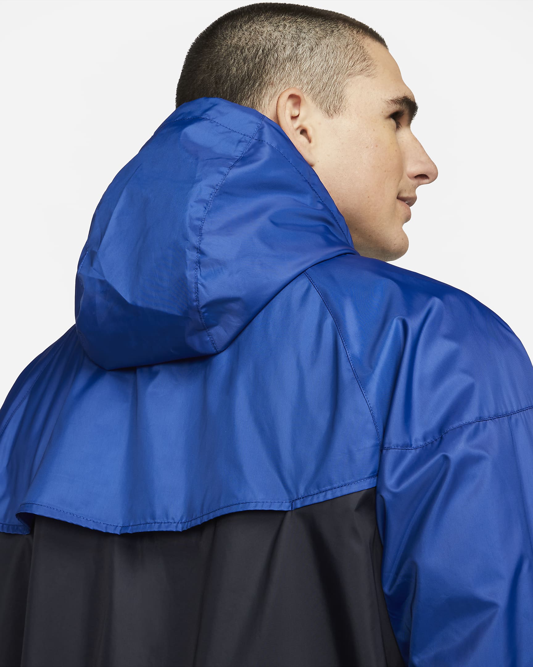 Chelsea F.C. Sport Essentials Windrunner Men's Nike Football Hooded Woven Jacket. Nike UK