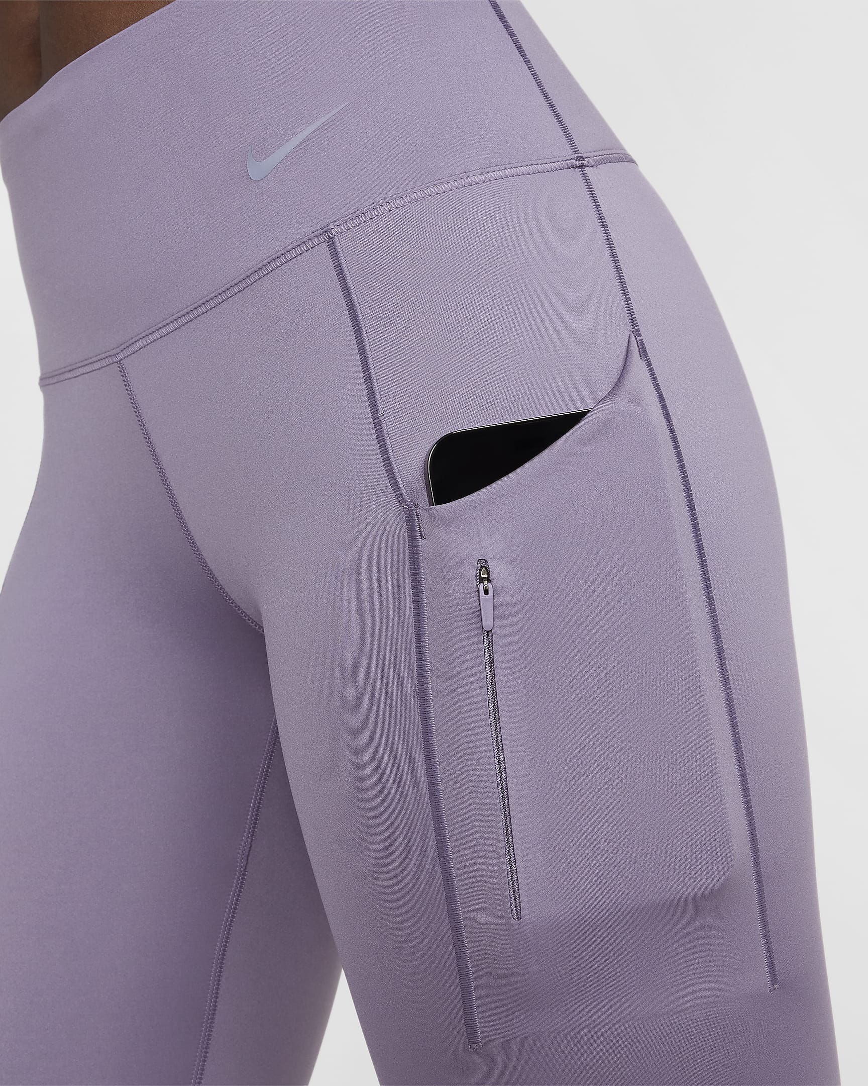 Nike Go Leggings de 7/8 de cintura mitjana i subjecció ferma amb butxaques - Dona - Daybreak/Negre