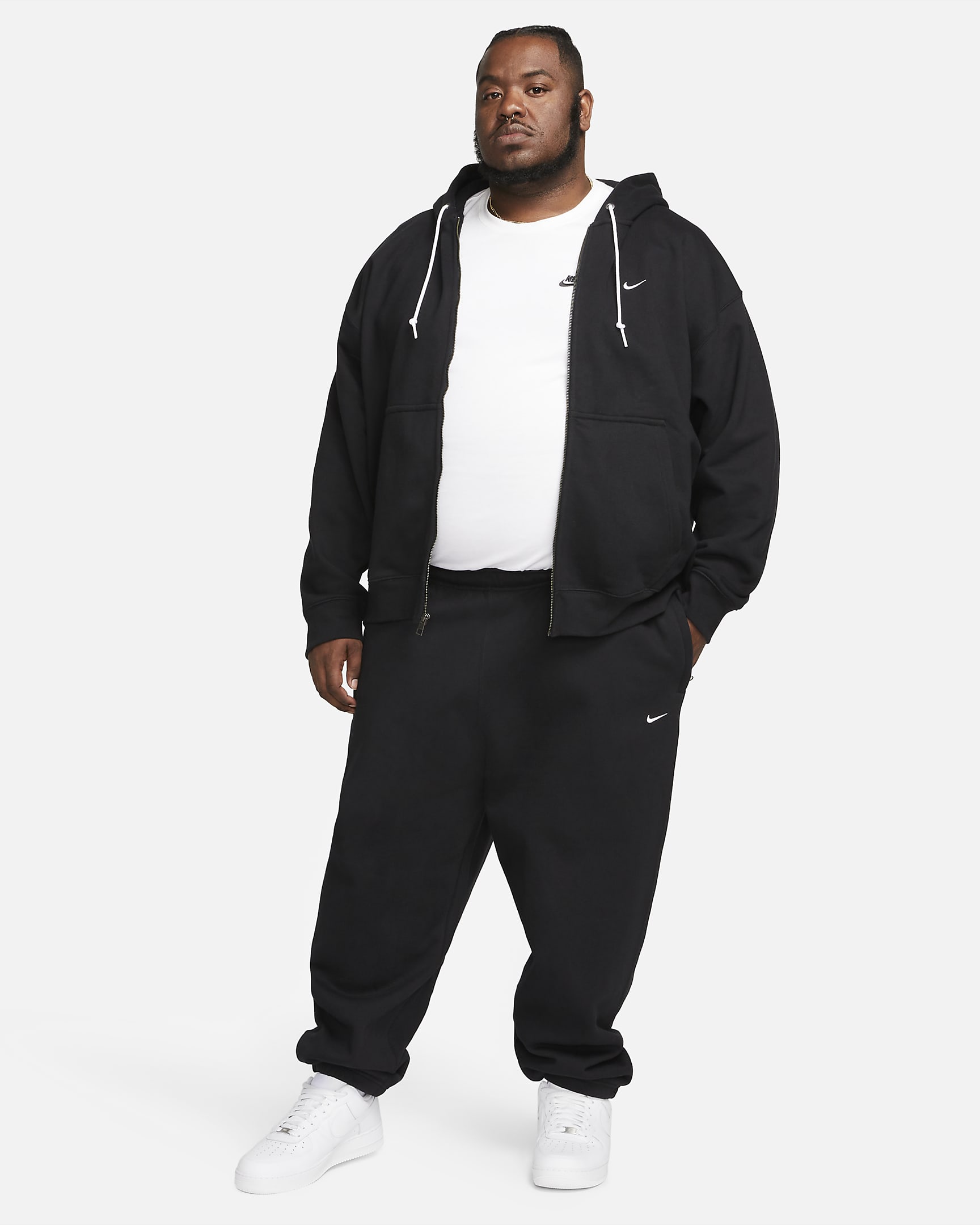 Pantalon en tissu Fleece Nike Solo Swoosh pour Homme - Noir/Blanc