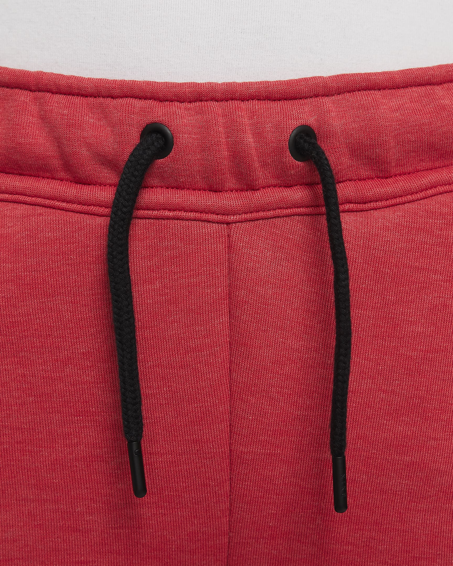 Pantaloni Nike Sportswear Tech Fleece - Ragazzo - Light University Red Heather/Nero/Nero