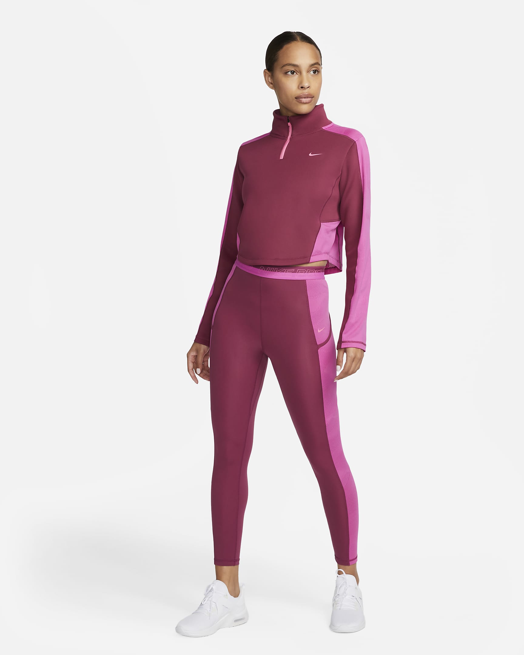 Nike Dri-FIT Women's Long-Sleeve 1/4-Zip Training Top. Nike BE