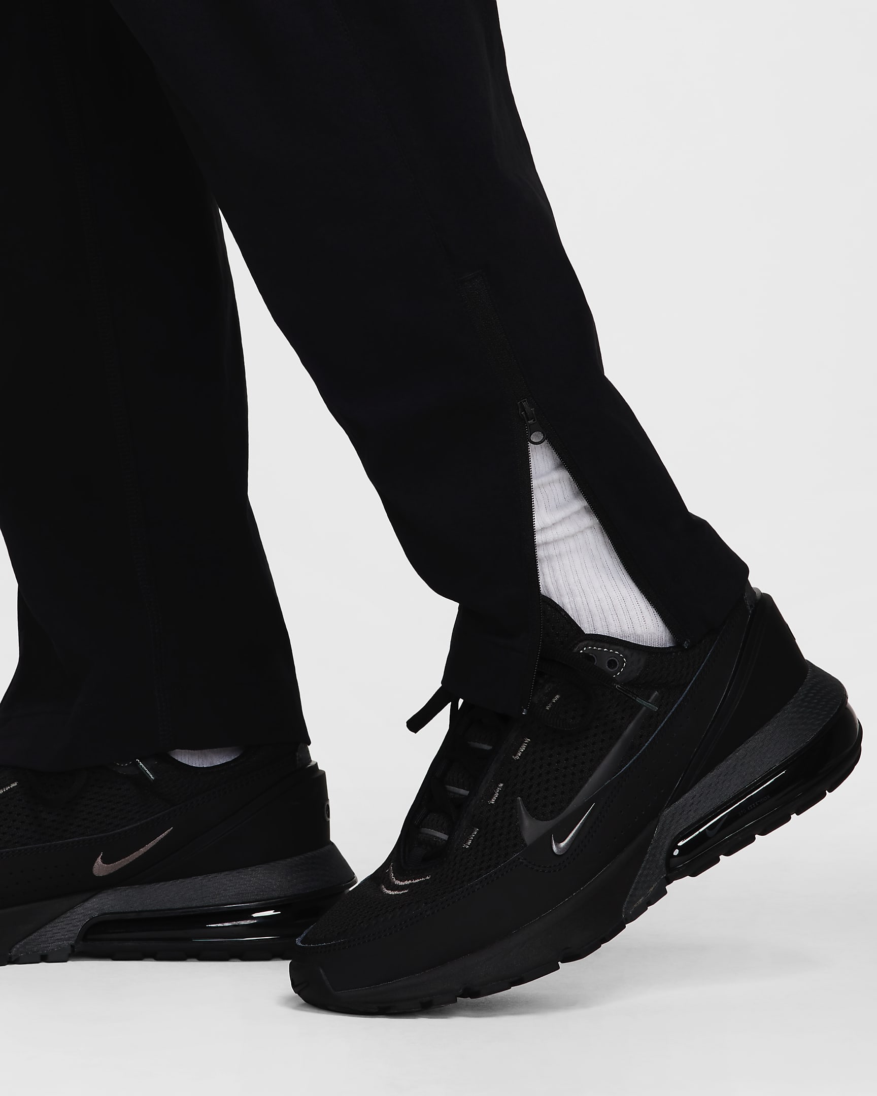 Pantaloni in tessuto Nike Tech – Uomo - Nero/Nero