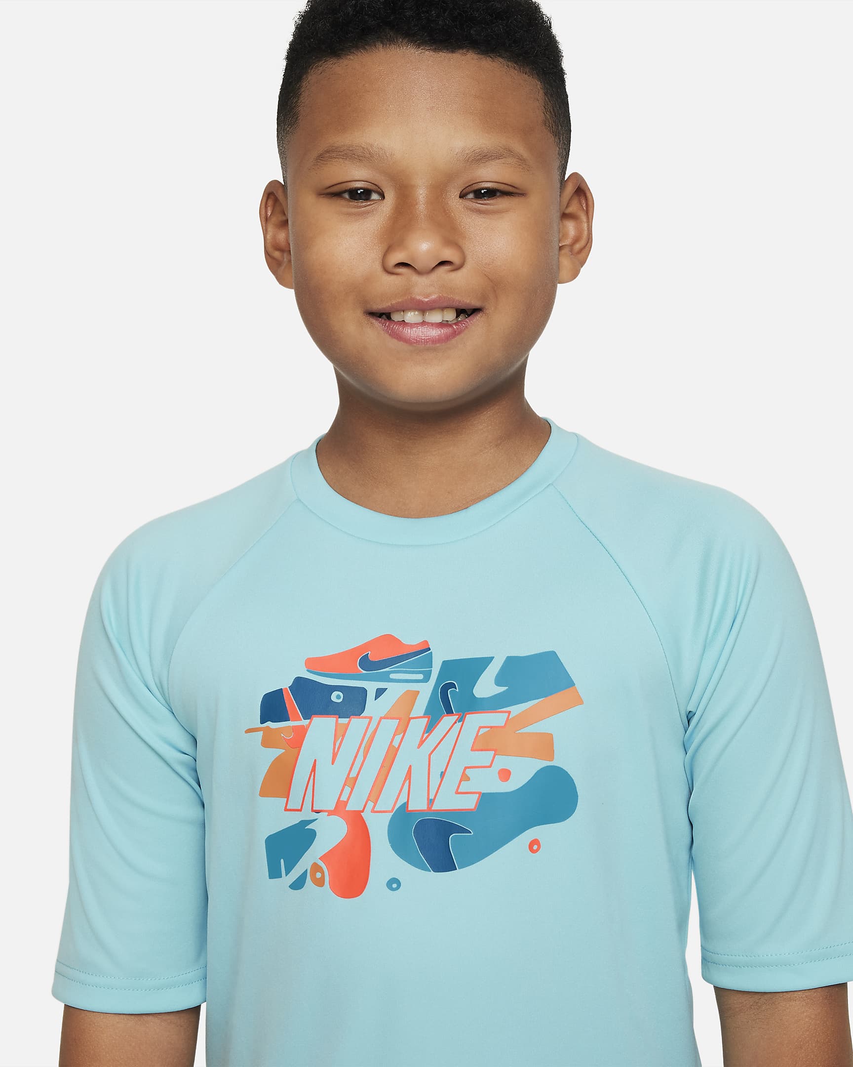 Nike Sneaker Big Kids' (Boys') ShortSleeve Hydroguard Swim Shirt.