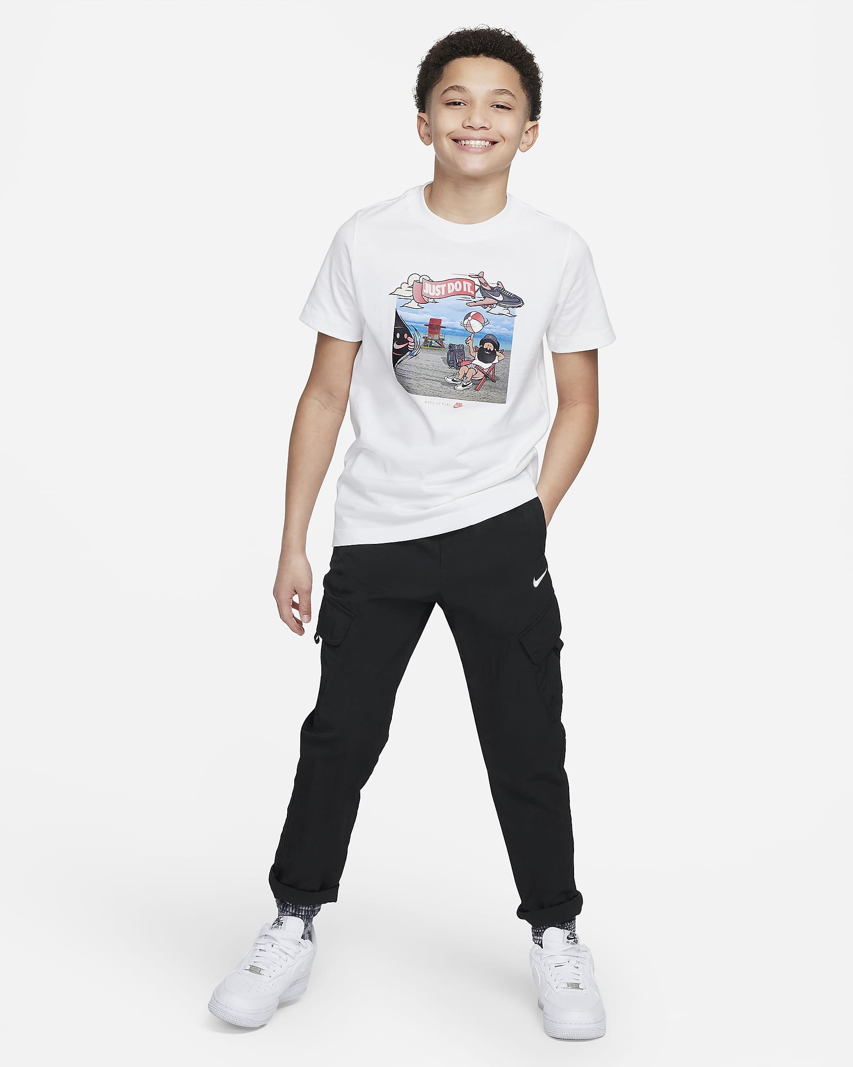 Nike Sportswear Big Kids' Graphic T-Shirt. Nike.com