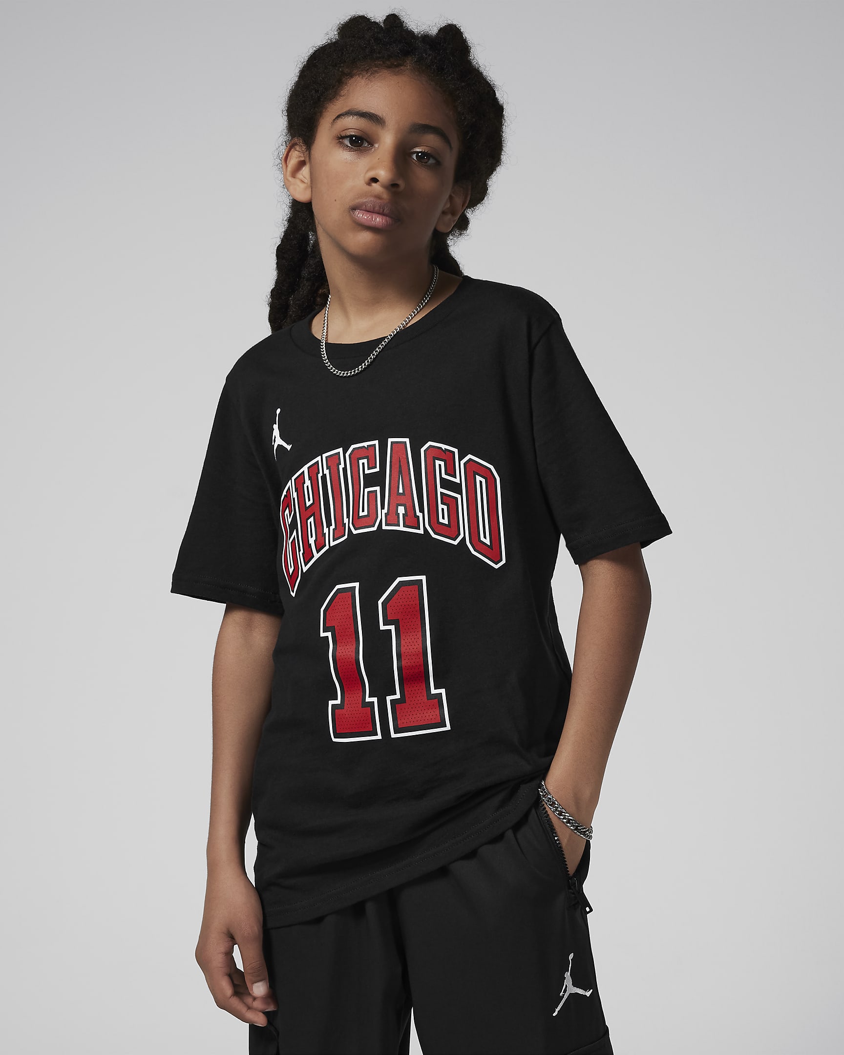 Chicago Bulls Statement Edition Older Kids' Jordan NBA T-Shirt. Nike PT