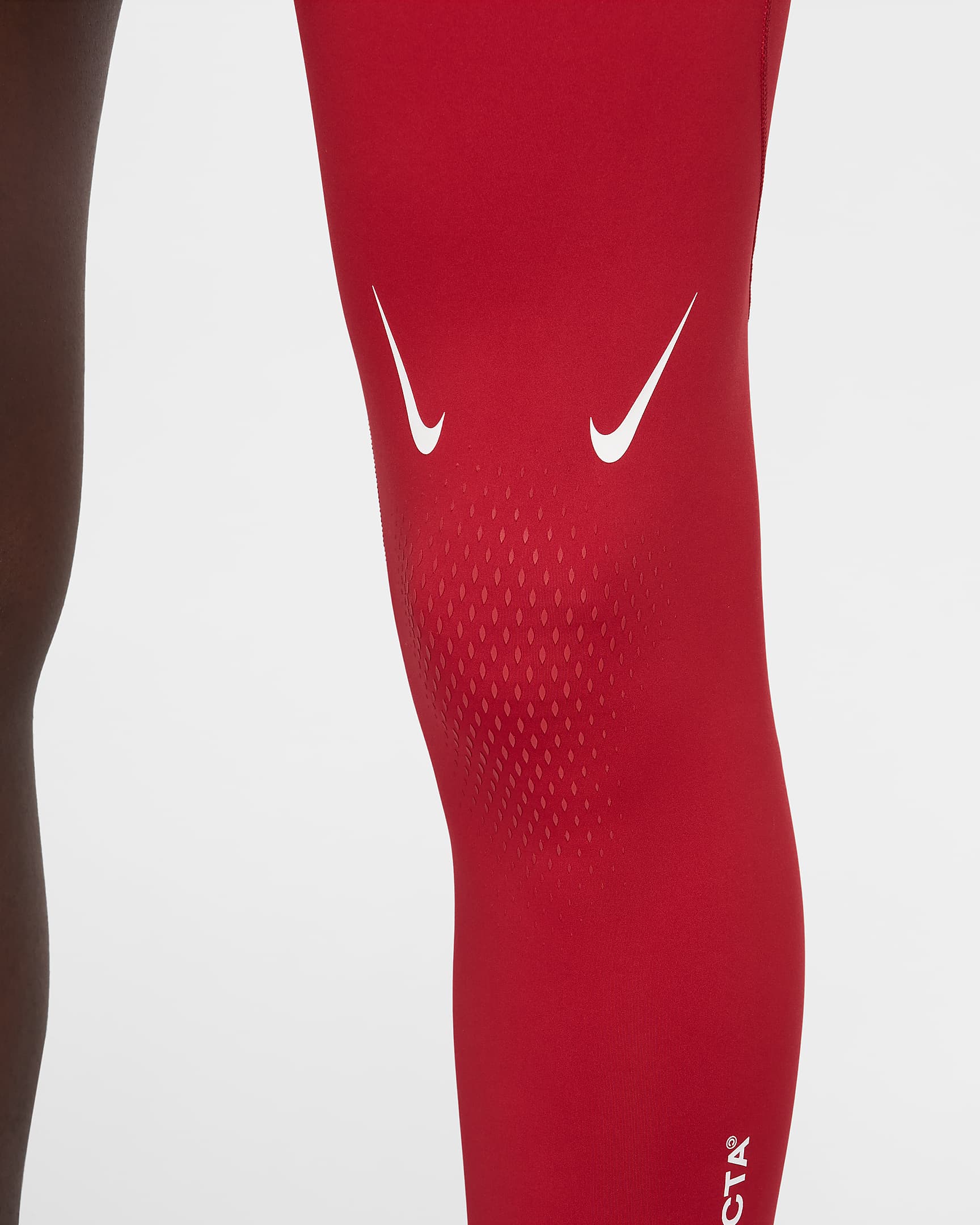 NOCTA Single-Leg-Basketball-Tights für Herren (links) - University Red/Weiß