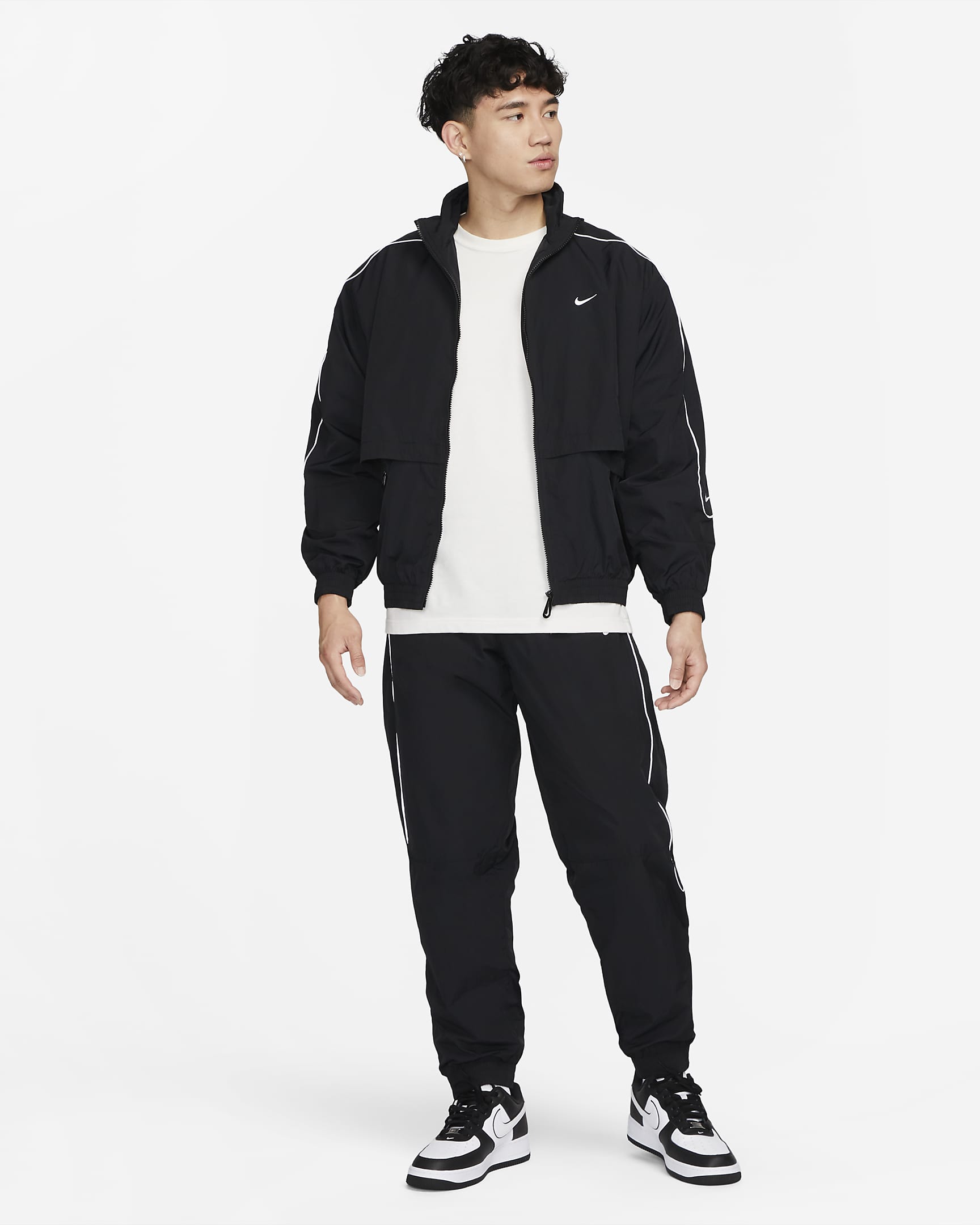 Nike Sportswear Solo Swoosh Men's Woven Tracksuit Jacket. Nike SG