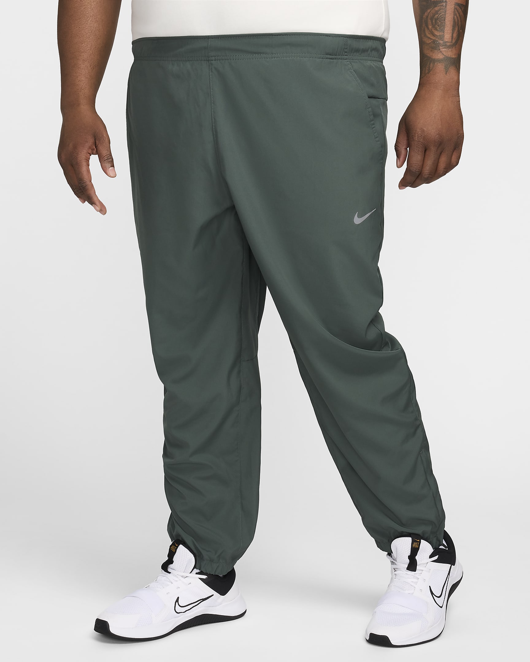 Pants Dri-FIT entallados versátiles para hombre Nike Form - Verde vintage/Negro