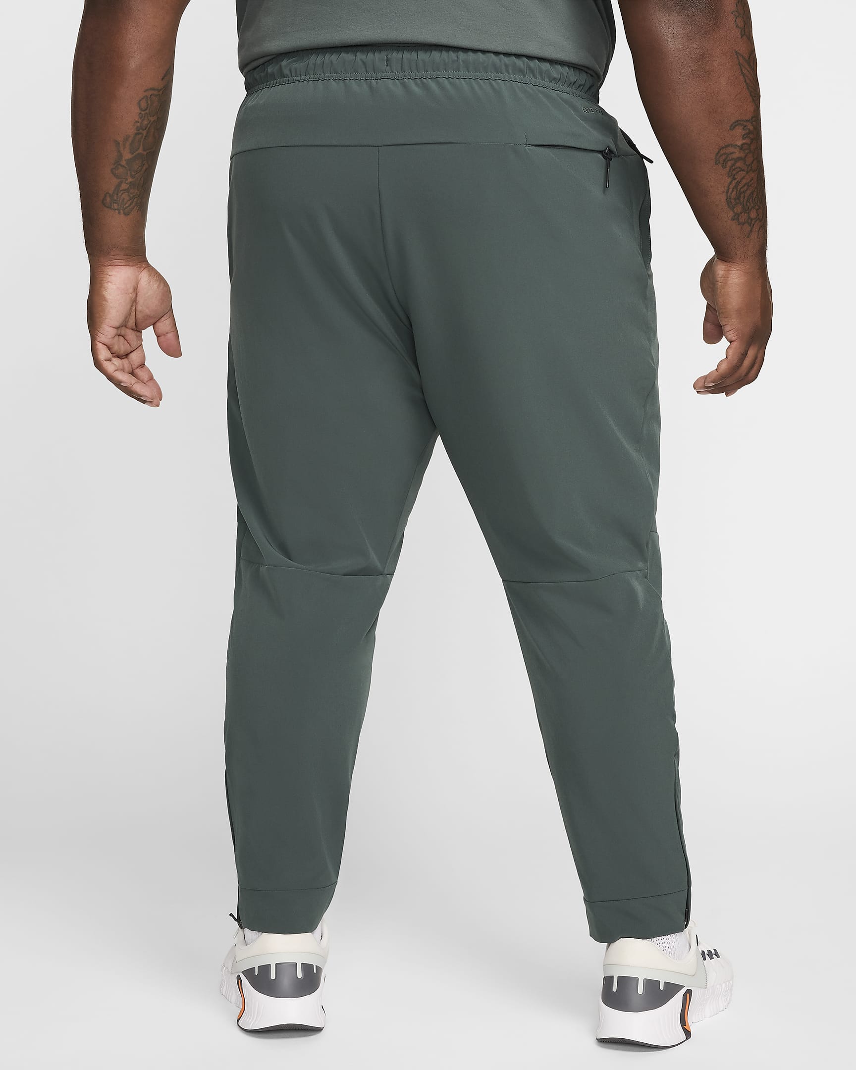 Pantalon avec ouvertures à zip Nike Dri-FIT Unlimited pour homme - Vintage Green/Noir/Vintage Green