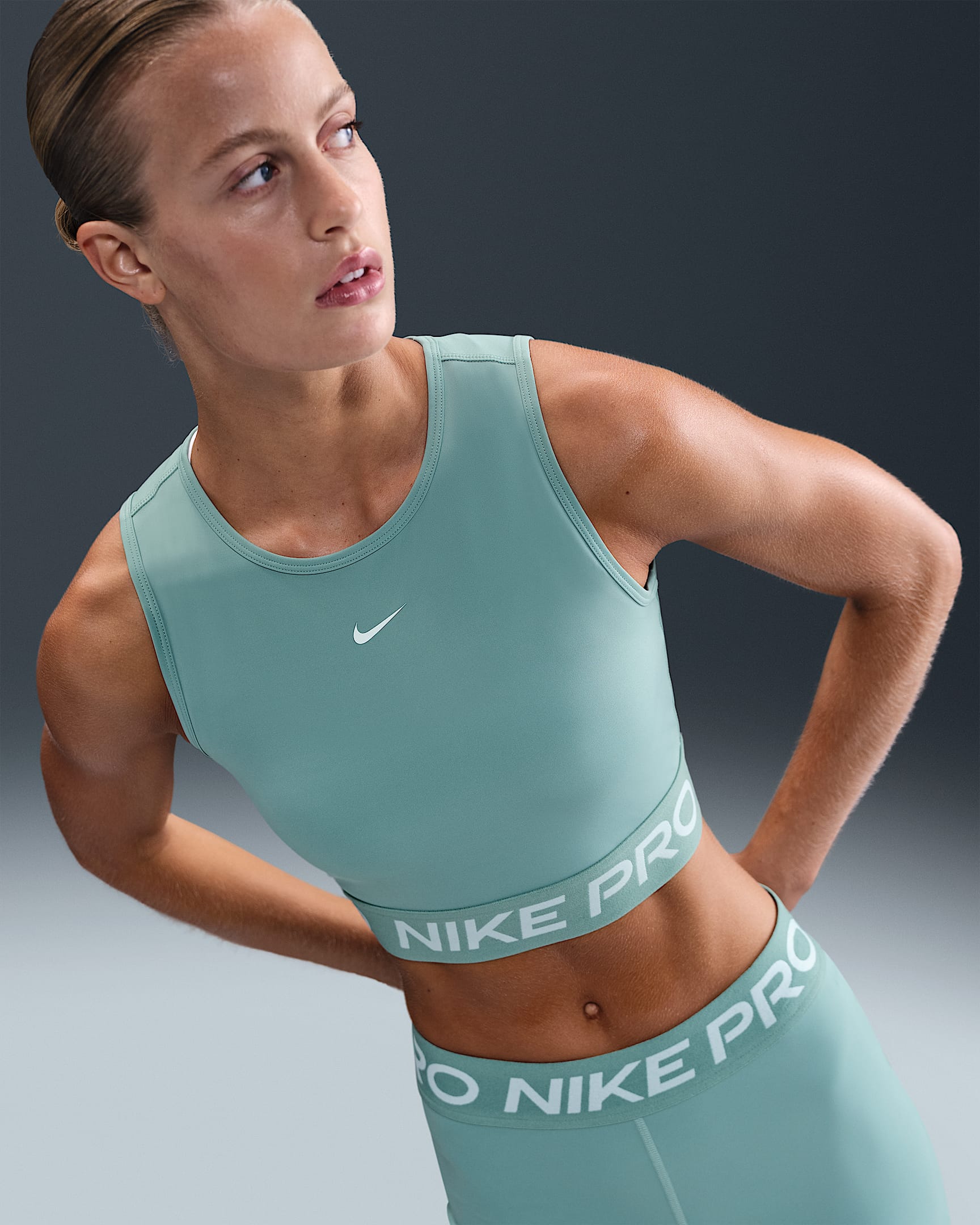 Nike Pro Women's Dri-FIT Cropped Tank Top - Cannon/White