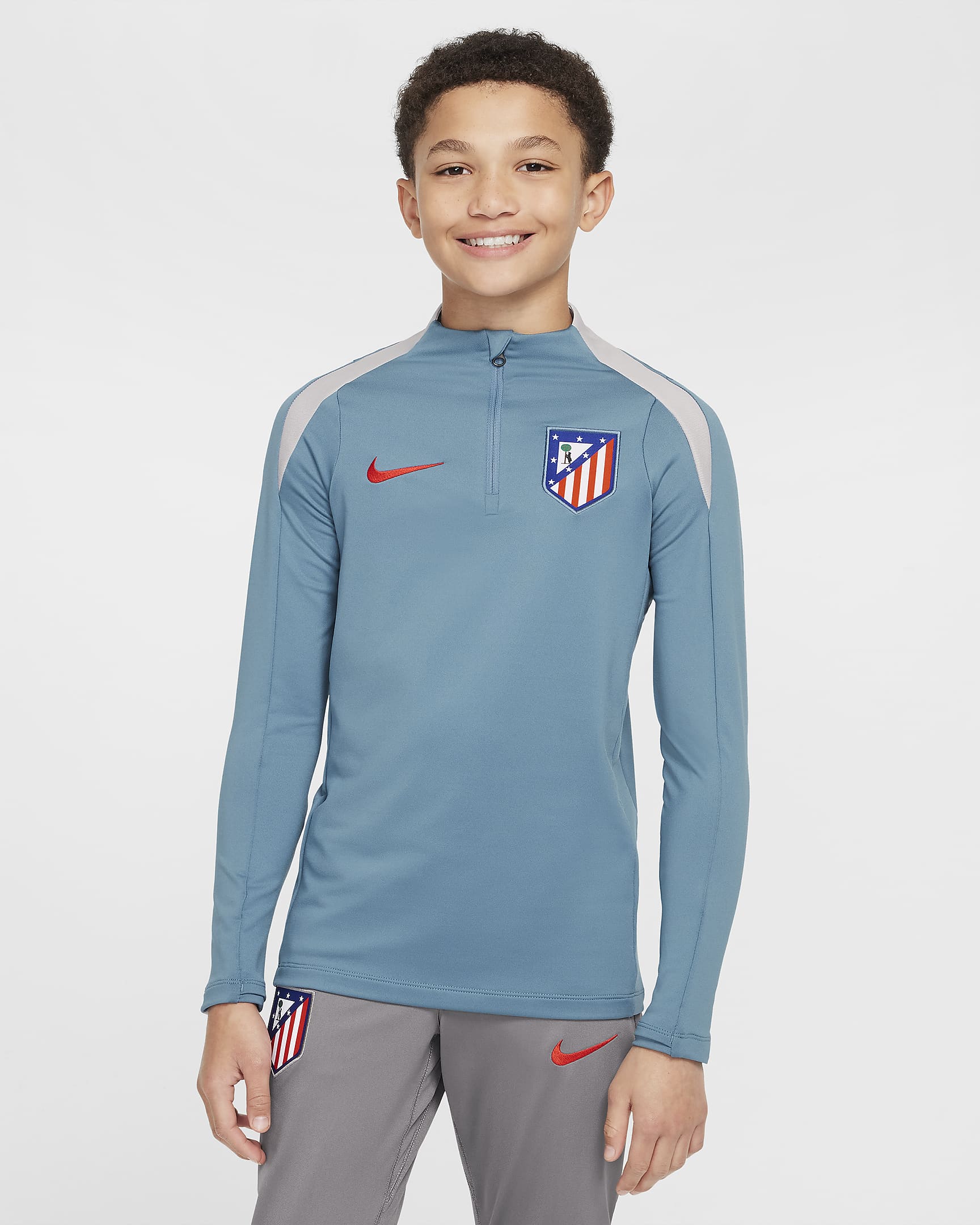 Atlético Madrid Strike Older Kids' Nike Dri-FIT Football Drill Top - Noise Aqua/Light Iron Ore/Light Crimson