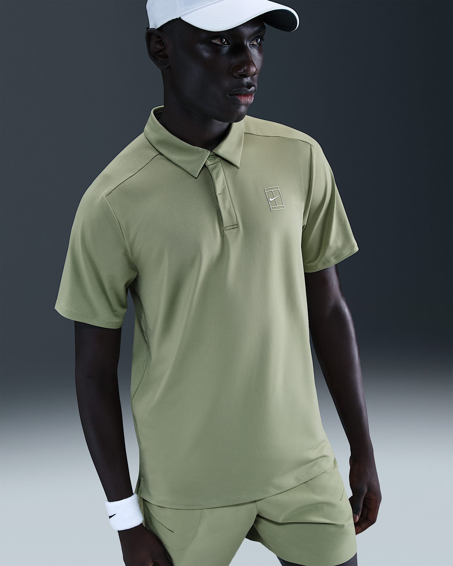 Polo de tennis Dri-FIT NikeCourt Advantage pour homme - Oil Green/Blanc