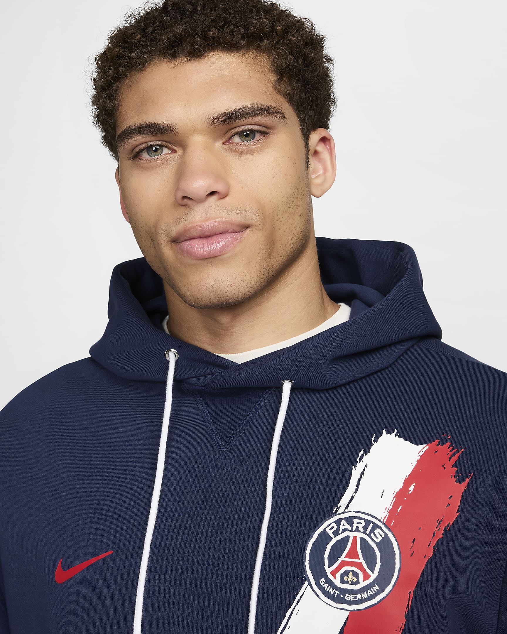 パリ サンジェルマン (PSG) スタンダード イシュー メンズ ナイキ Dri-FIT サッカー プルオーバー パーカー - ミッドナイトネイビー/ユニバーシティレッド