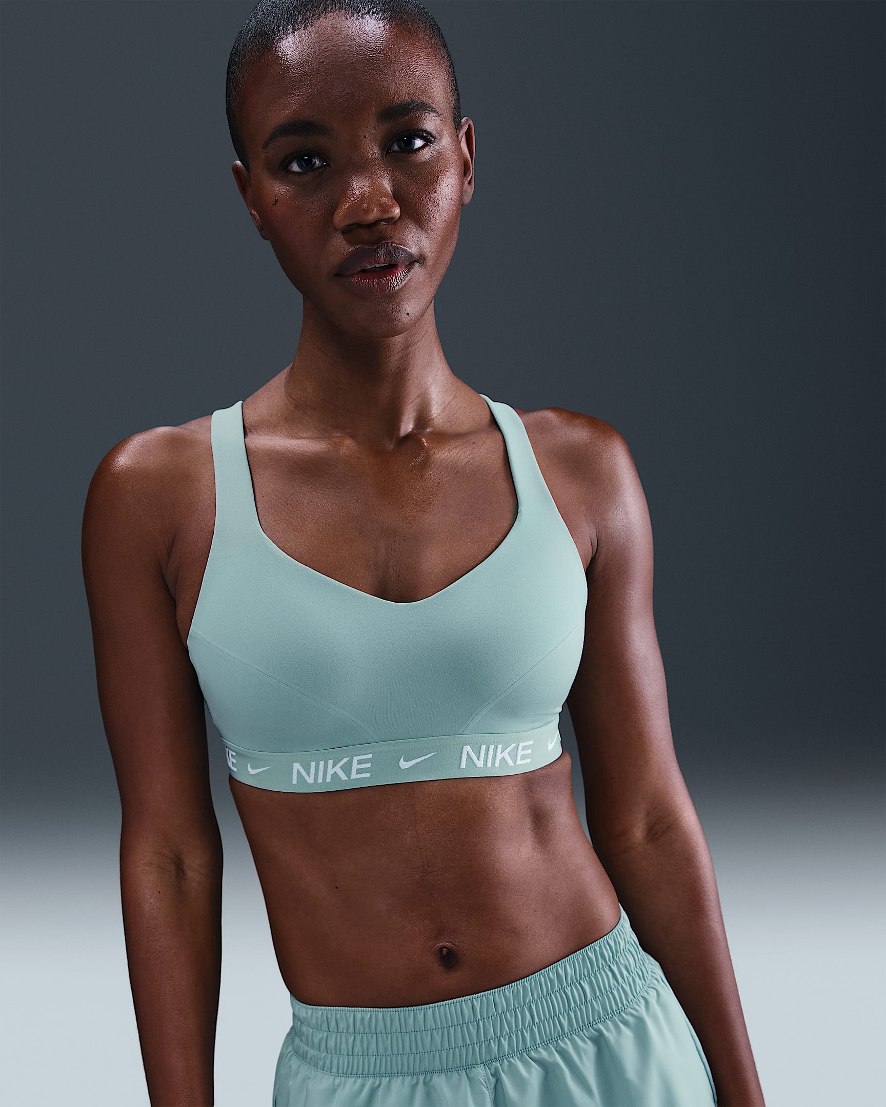 Bra deportivo ajustable acolchado para mujer Nike Indy High Support - Cañón