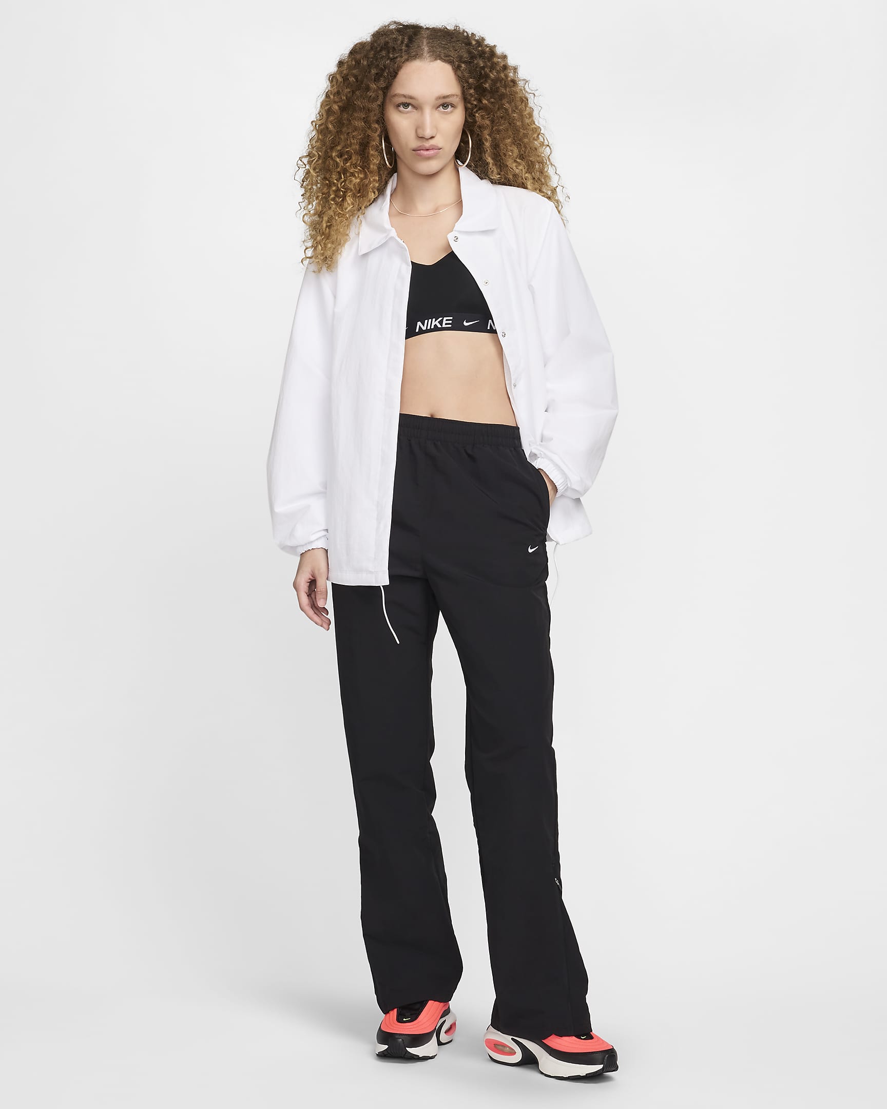 Pantalon taille haute anti-UV à ourlet ouvert et zip Nike Sportswear Essential pour femme - Noir/Blanc