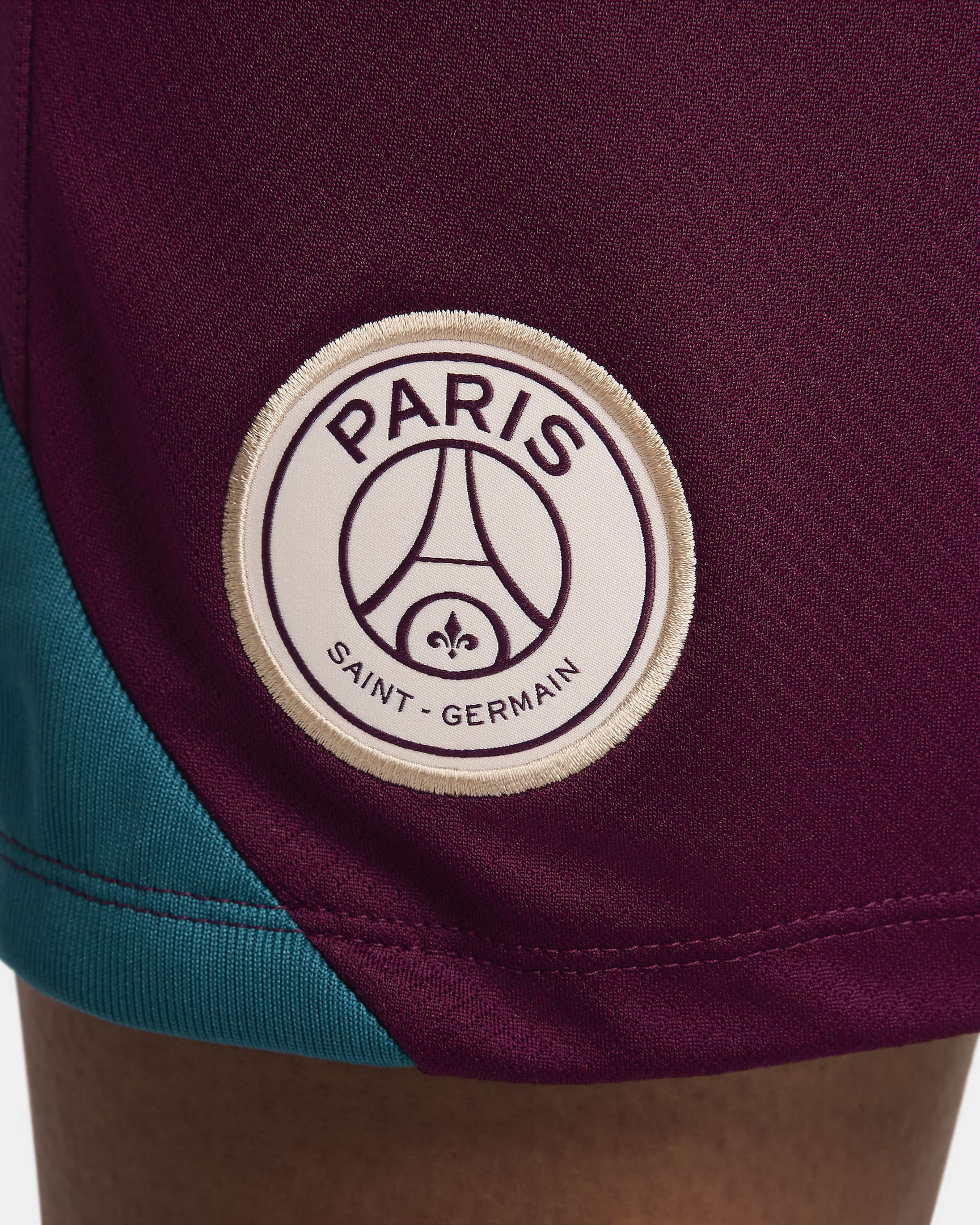 Męskie dzianinowe spodenki piłkarskie Jordan Dri-FIT Paris Saint-Germain Strike - Bordeaux/Geode Teal/Guava Ice