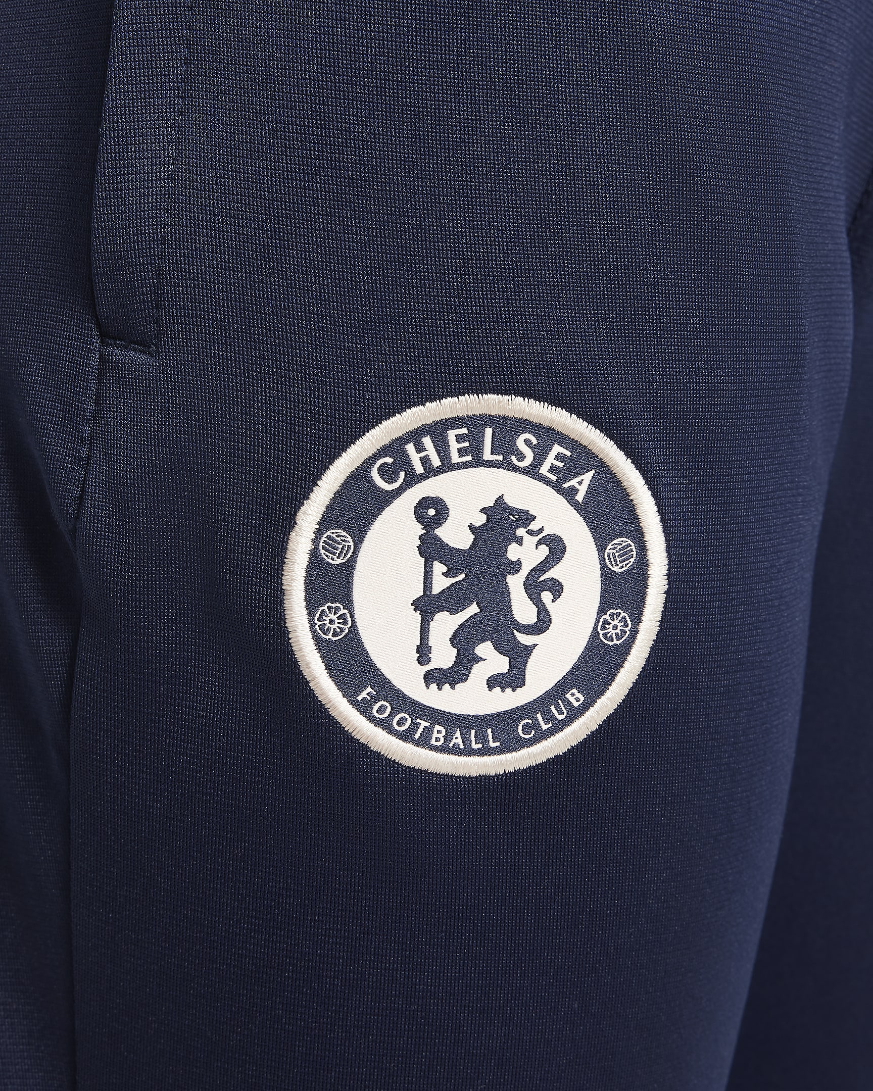 Chelsea F.C. Strike Older Kids' Nike Dri-FIT Football Knit Tracksuit - Obsidian/Light Photo Blue/Guava Ice