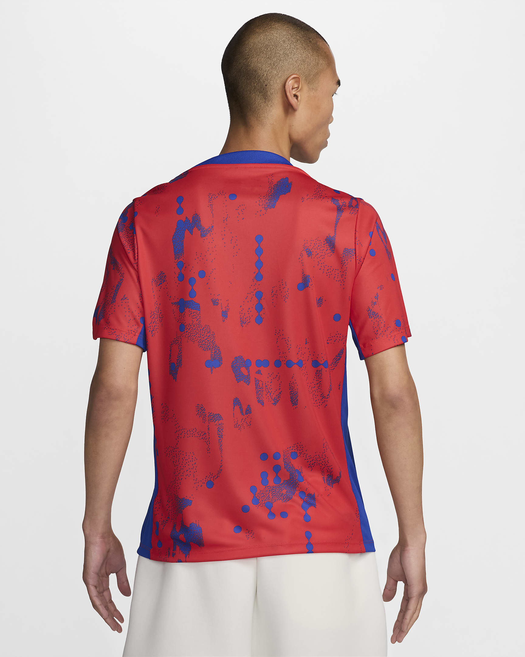 Atlético Madrid Academy Pro Nike Dri-FIT warming-upvoetbaltop met korte mouwen voor heren - Light Crimson/Hyper Royal/Wit