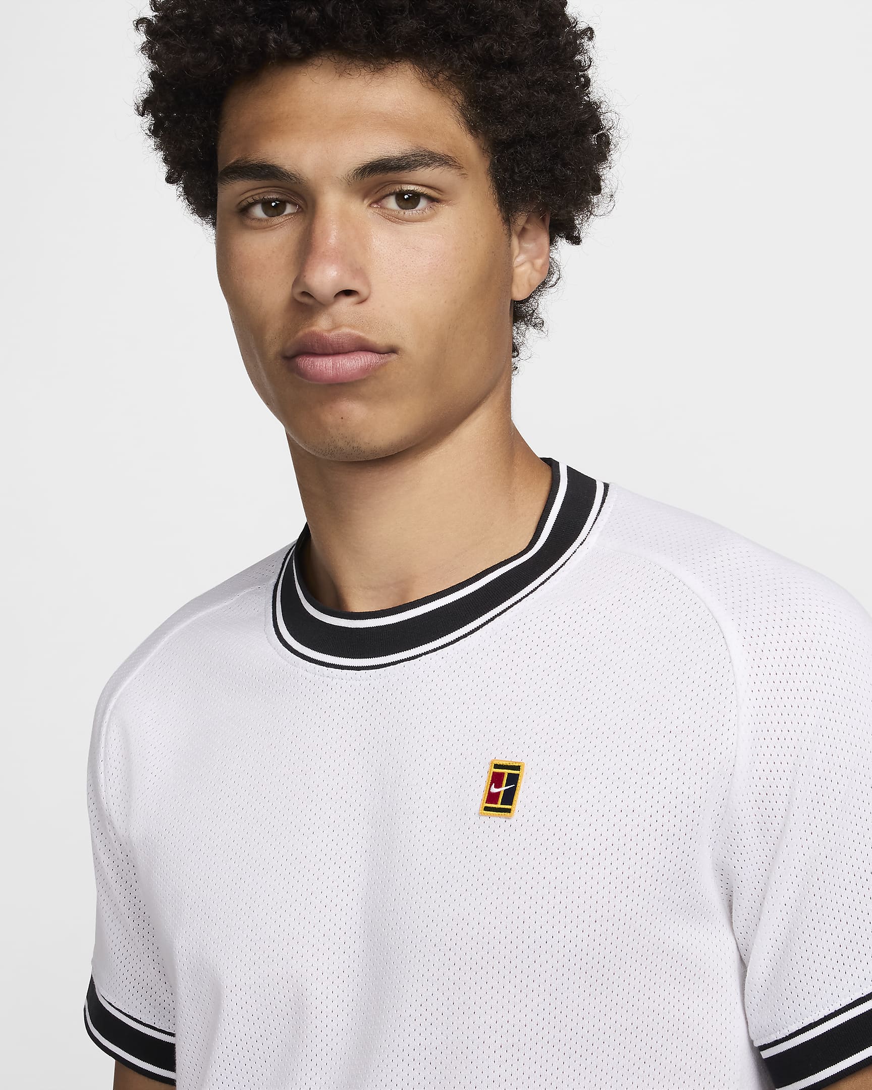 Haut de tennis à manches courtes NikeCourt Heritage pour homme - Blanc/Noir