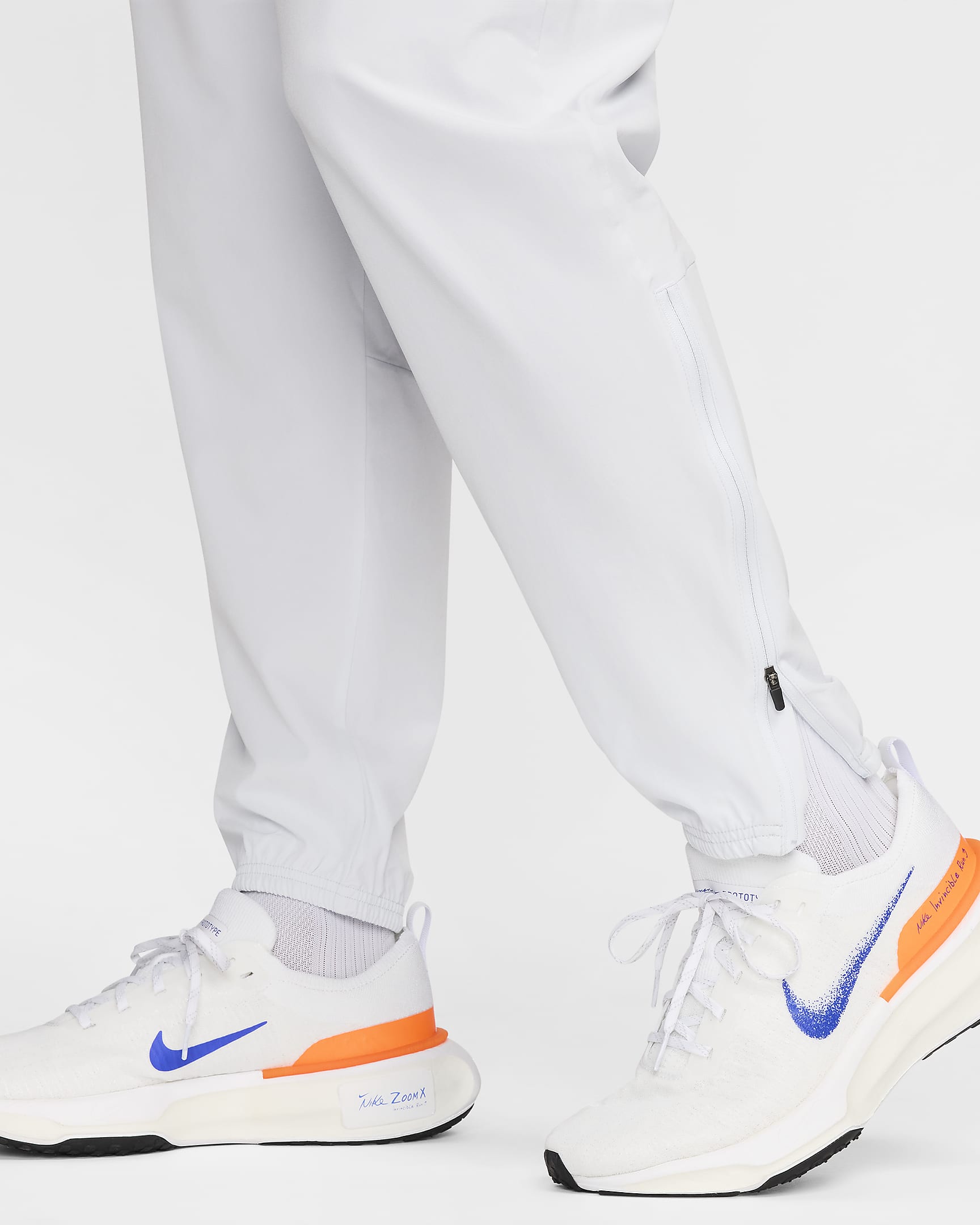 Męskie spodnie do biegania Nike Challenger - Pure Platinum