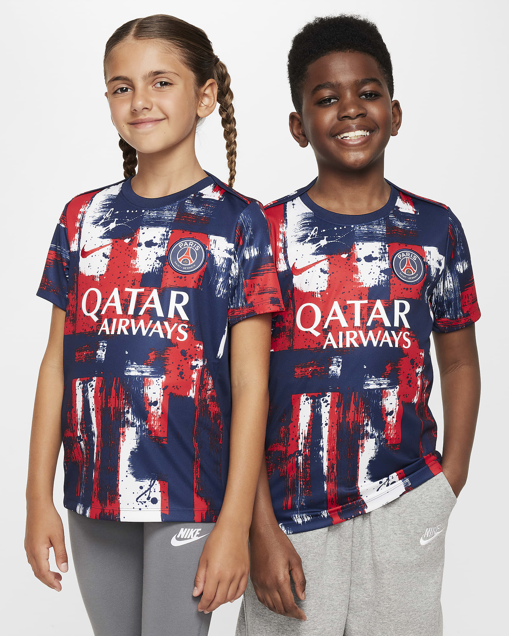 Paris Saint-Germain Academy Pro Home Older Kids' Nike Dri-FIT Football Pre-Match Short-Sleeve Top - Midnight Navy/University Red/White/University Red