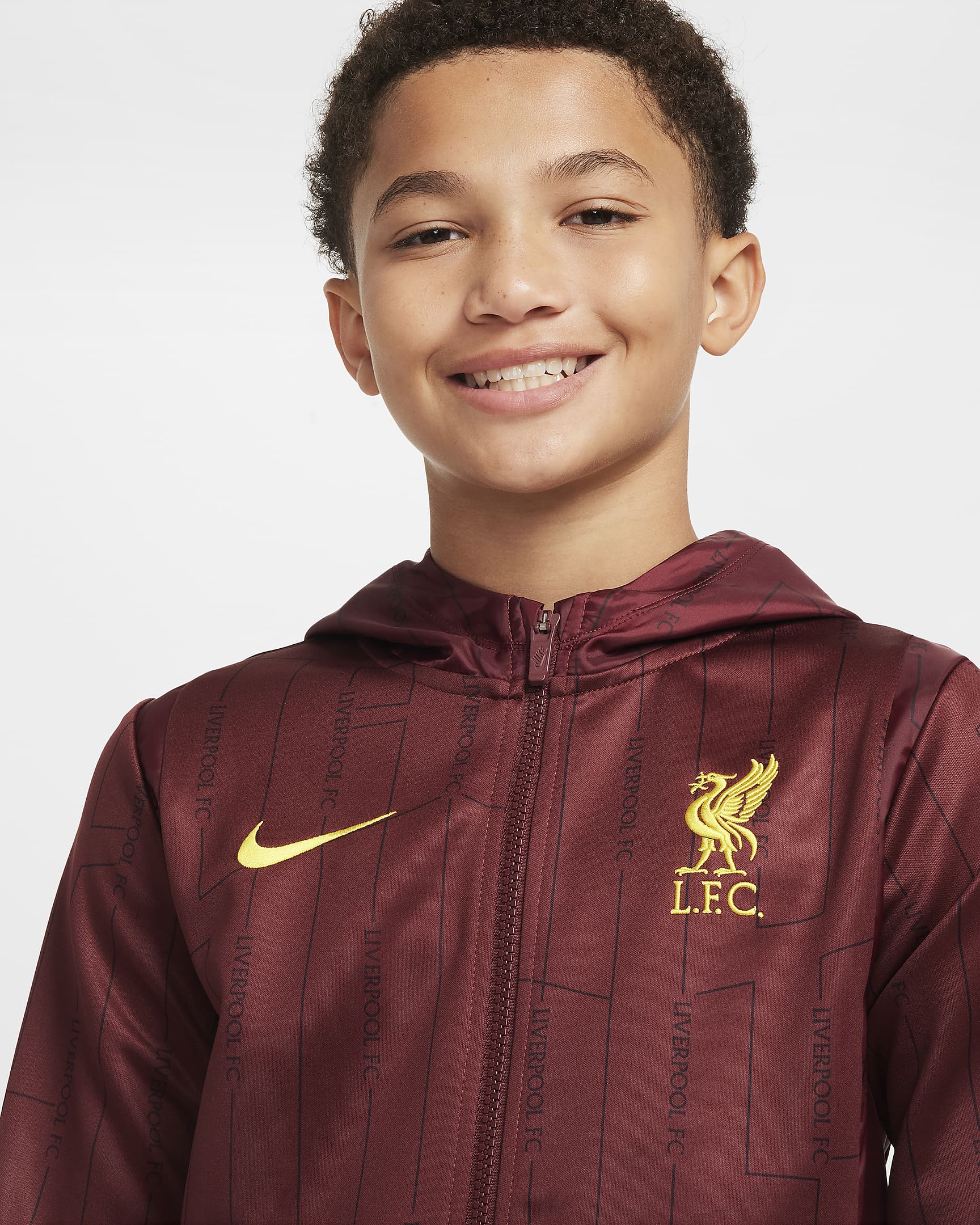 Liverpool F.C. Home Older Kids' Nike Football Woven Tracksuit - Dark Team Red/Chrome Yellow