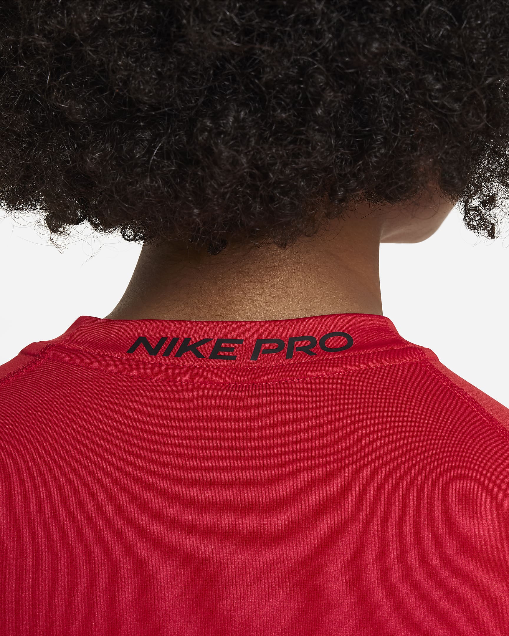 Playera de manga corta Dri-FIT para niño talla grande Nike Pro - Rojo universitario/Negro